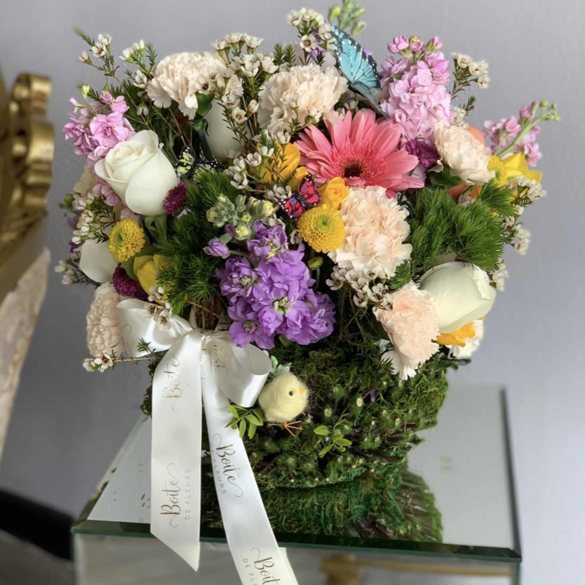 A teal or pink basket full of colorful spring florals!