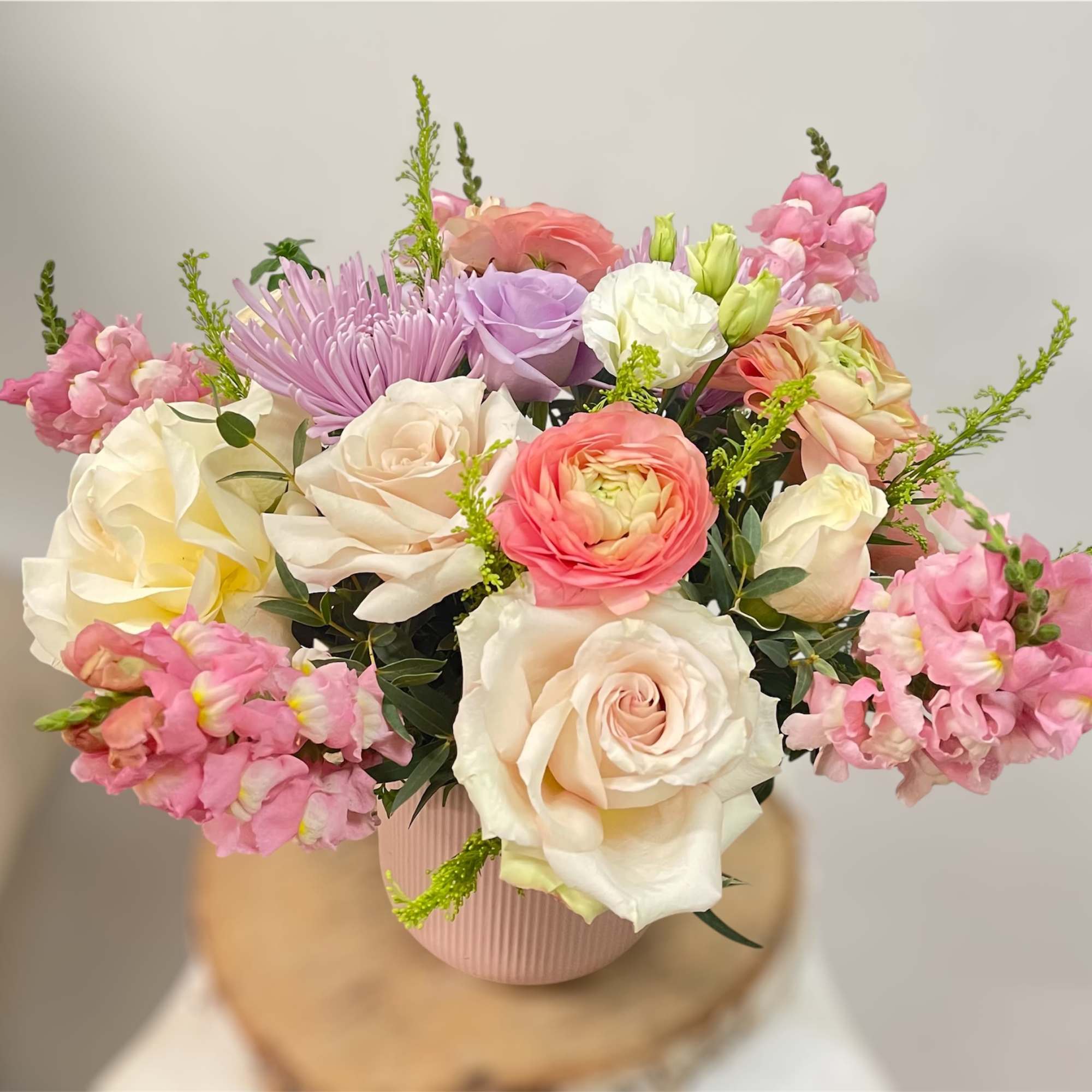 Theme Colors: Blush color, Light pink ,Light purple.

Featured Blooms: Roses, alstroemeria, Ranunculus