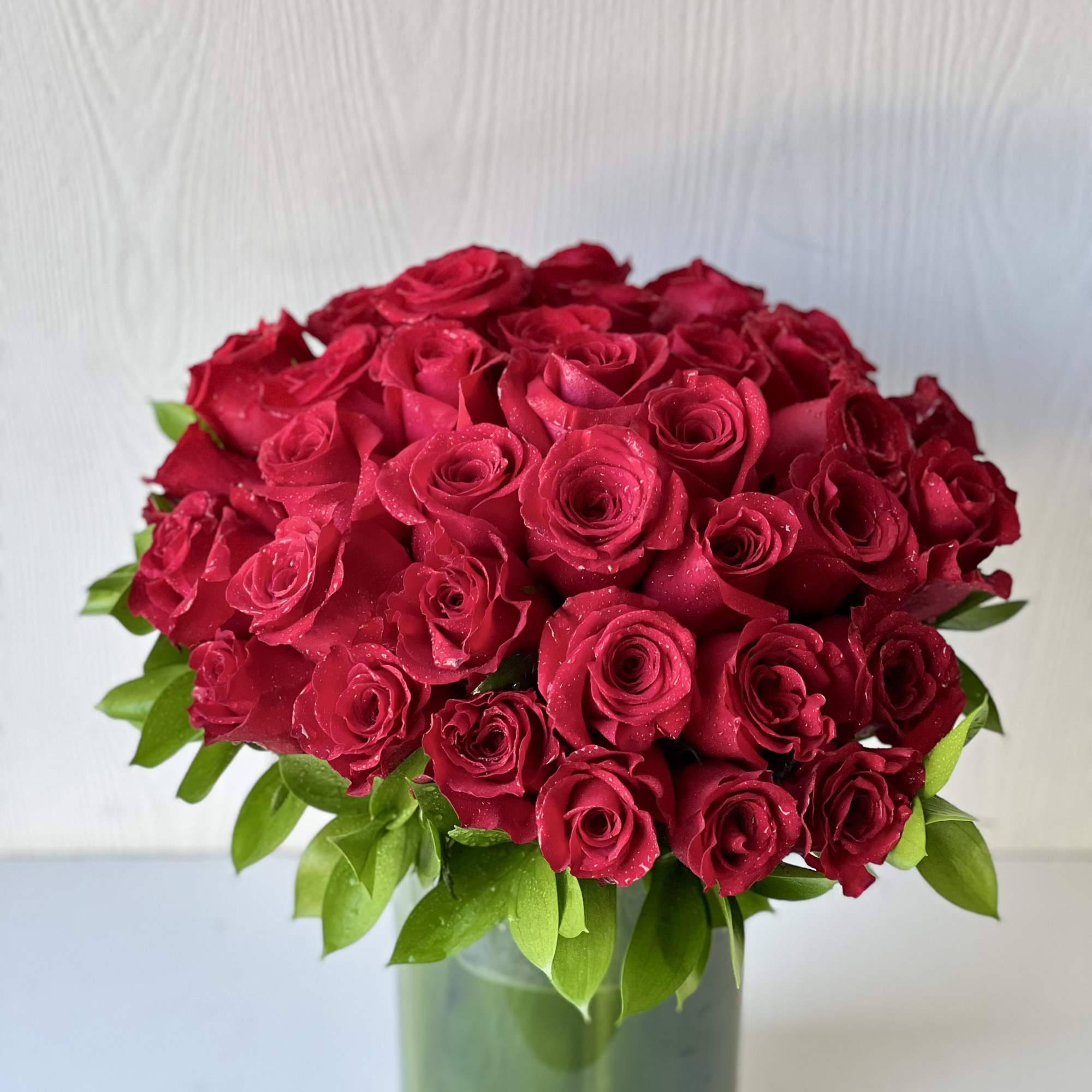 Our stunning 3 Dozen Red Rose arrangement is the epitome of romance