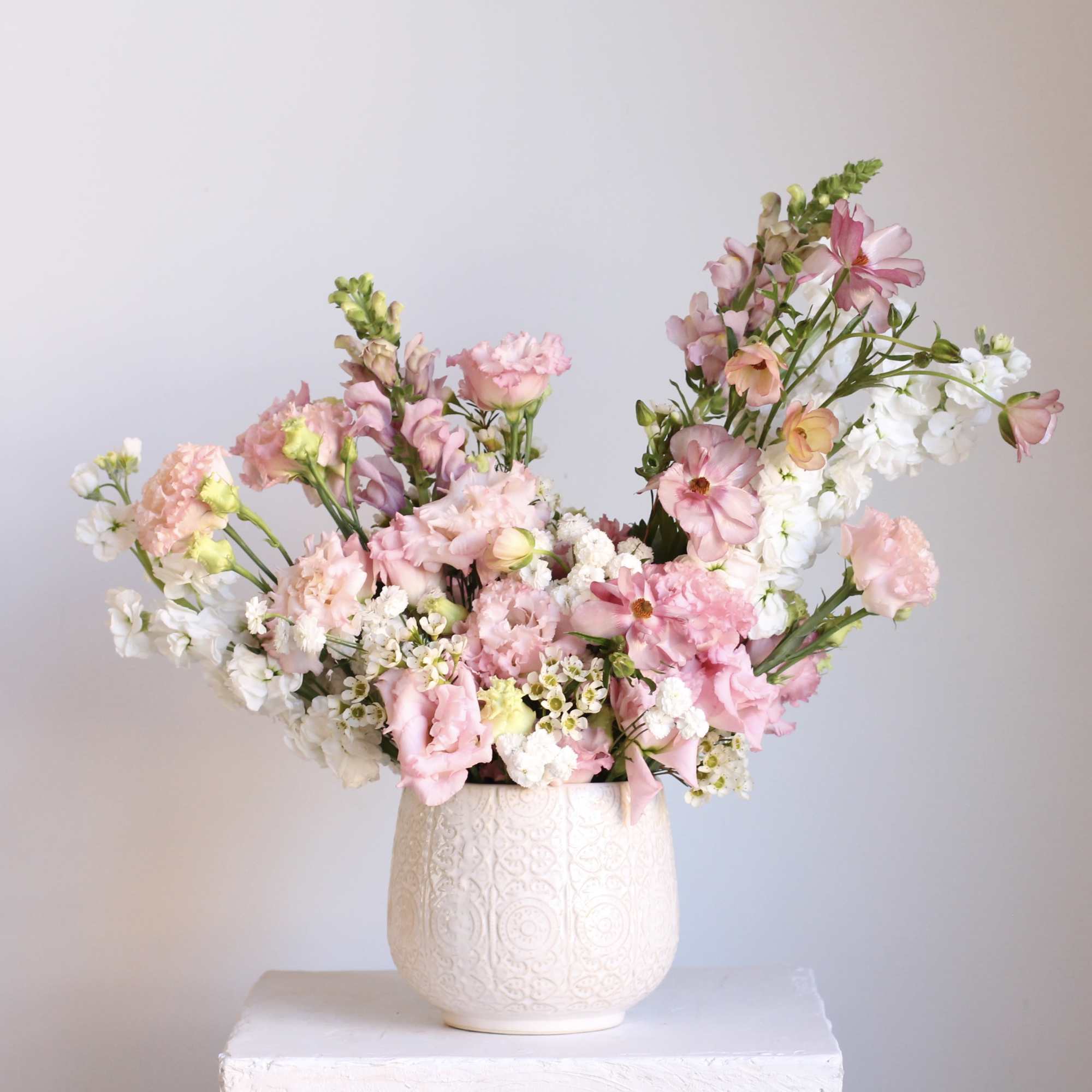 Brighten someone&rsquo;s day with our Blush Blooms arrangement&mdash;a celebration of all things