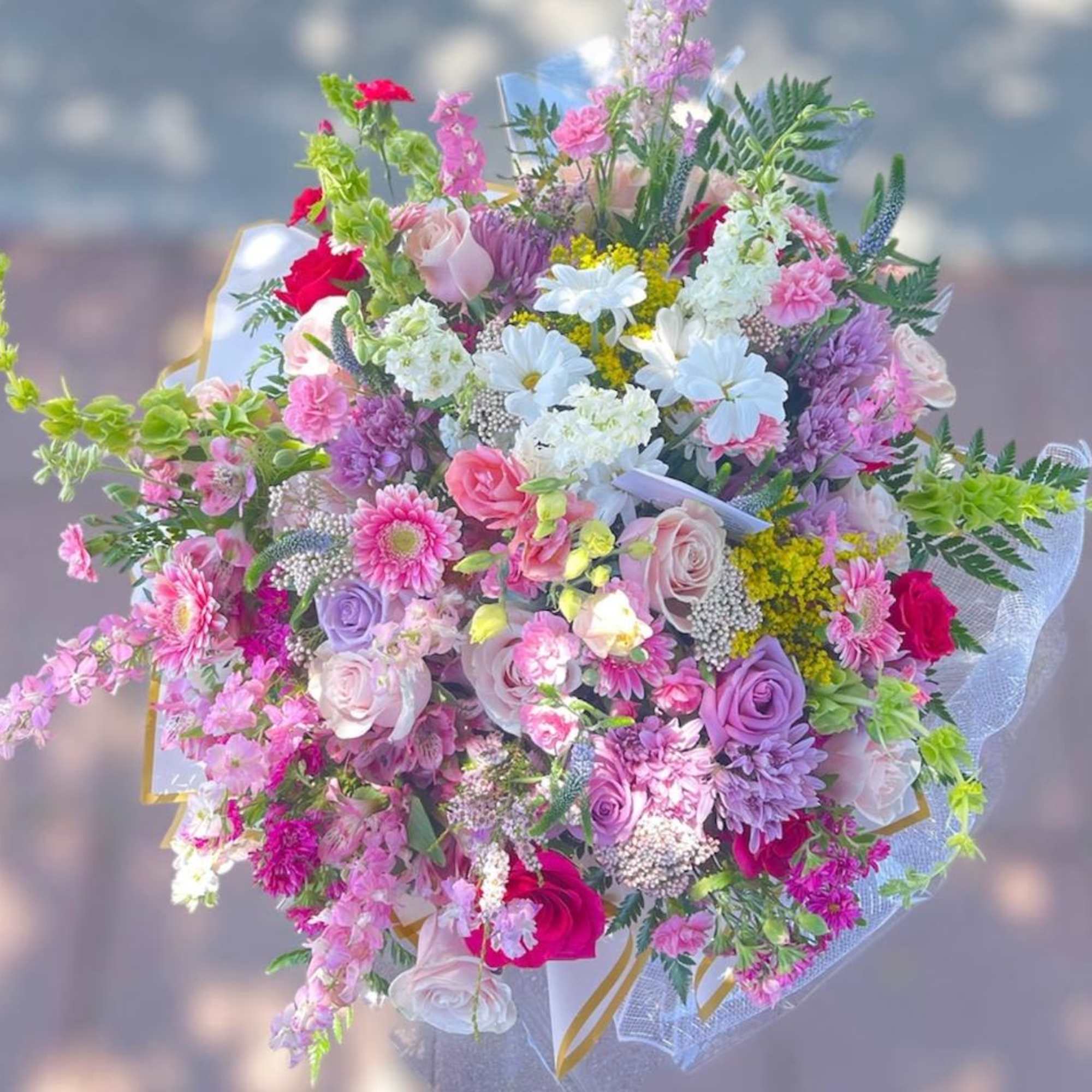 Theme Colors: colorful.

Featured Blooms: flower of season bouquet.
 

HK Flowers have a