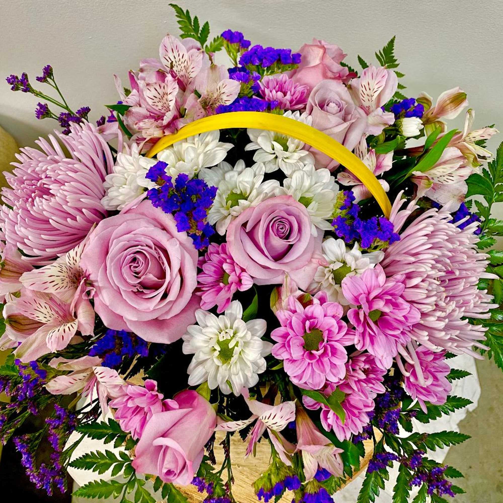 Product Information

Theme Colors: Shades of pinks

Featured Blooms: Roses, Alstroemeria, Chrysanthemums, Daisies, wild