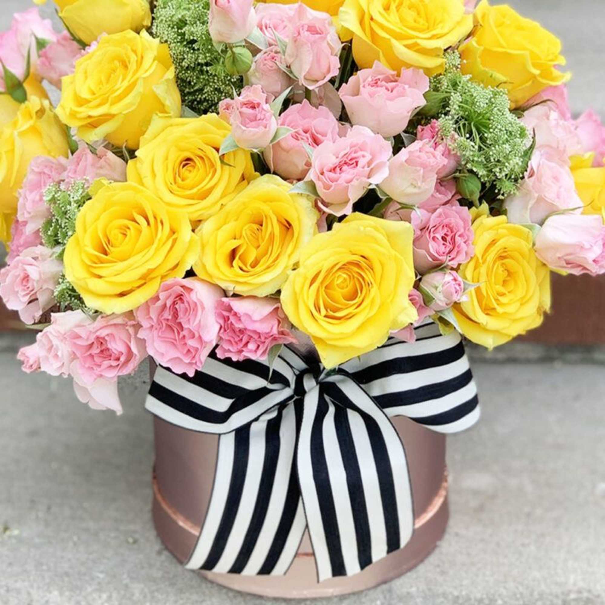 Yellow roses represents friendship , joy, and affection.  Pink roses symbolizes