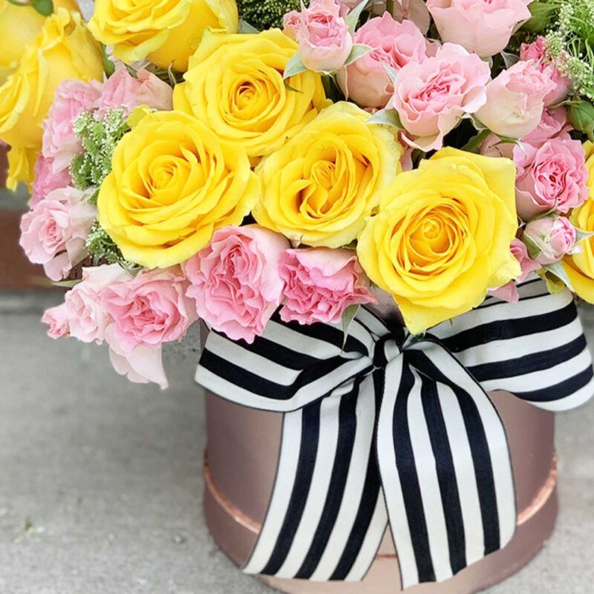 Yellow roses represents friendship , joy, and affection.  Pink roses symbolizes