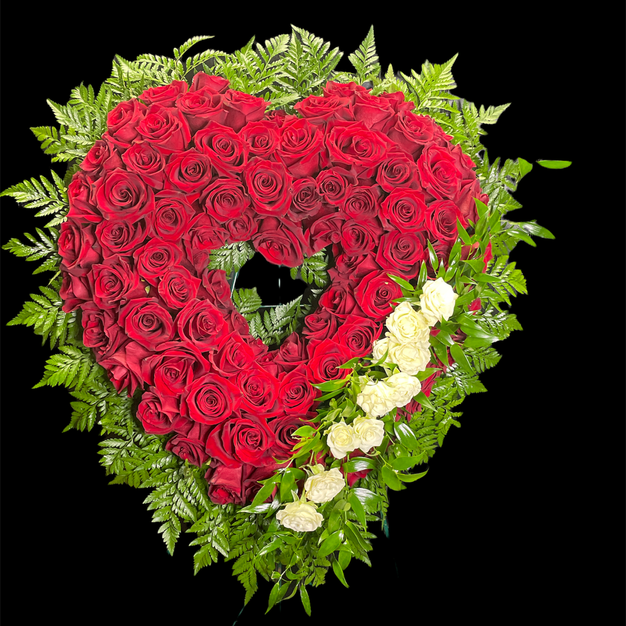 A beautiful red and white open heart with all roses