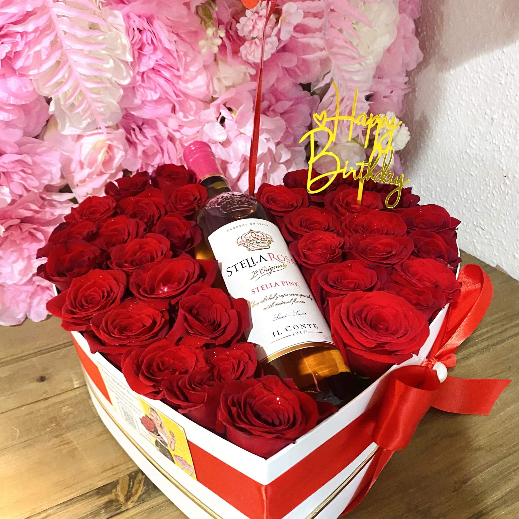 Brings 30-35 roses &amp; a bottle of stella rose wine, depending on