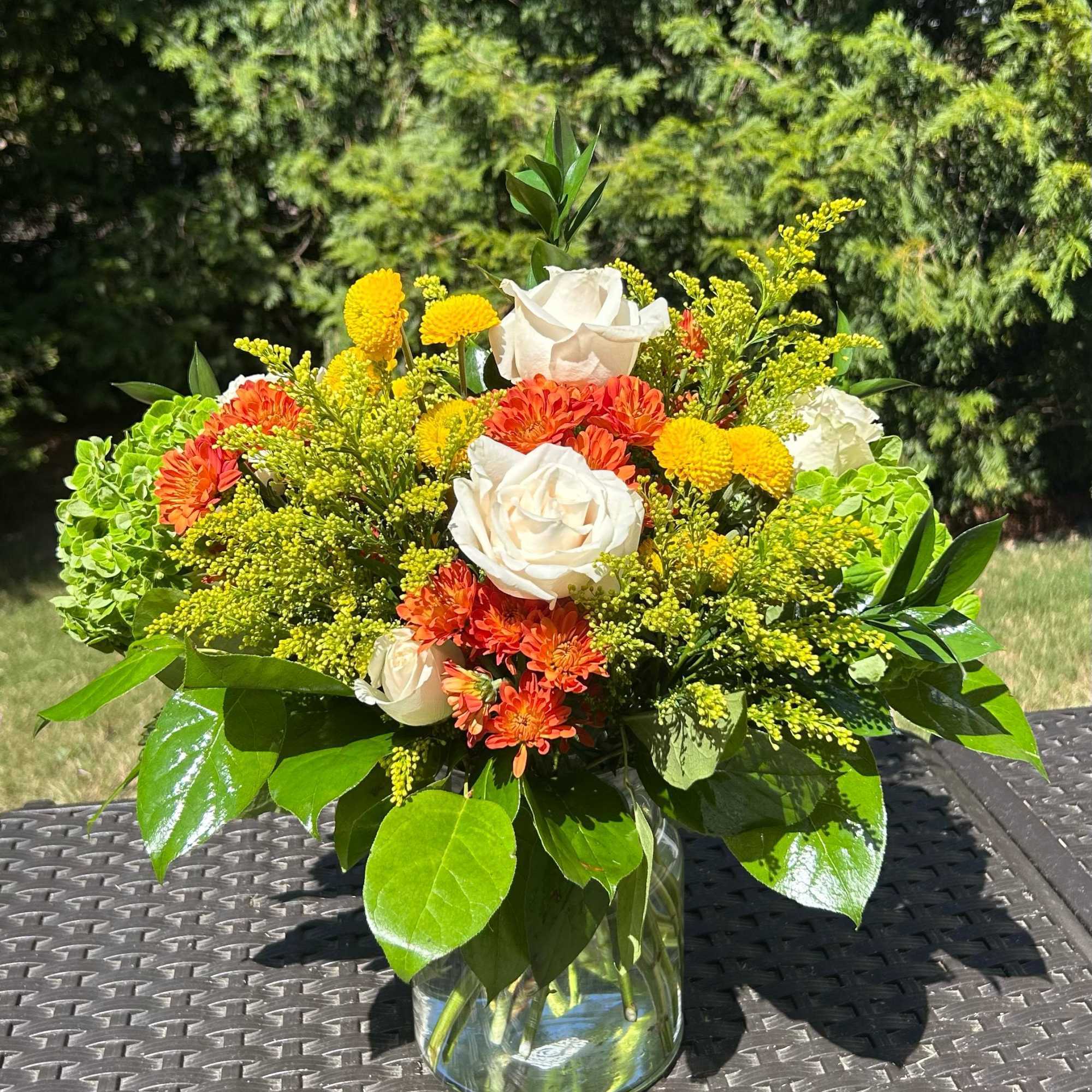 Light, elegant, and full of seasonal color, the Fall Foliage Bouquet is