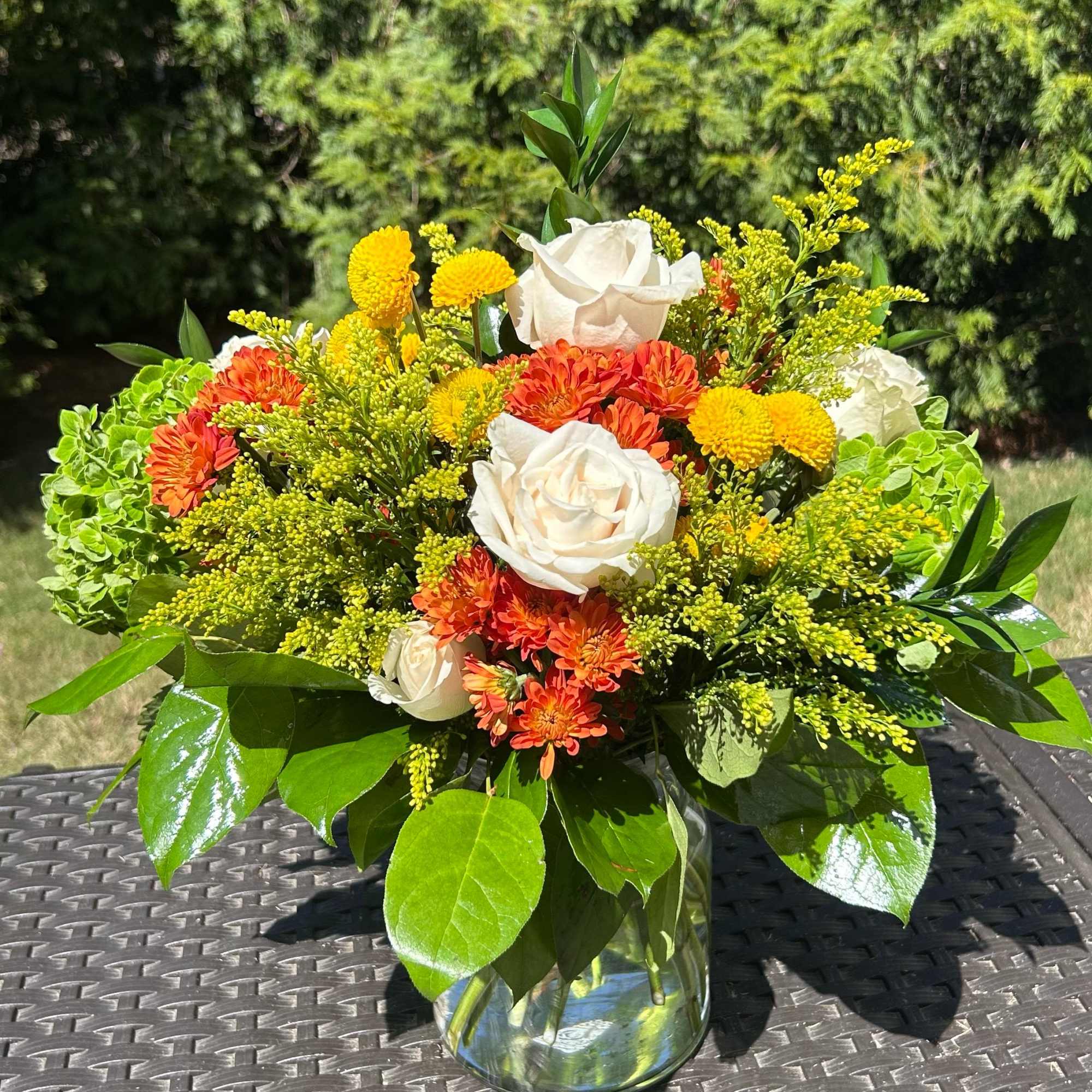 Light, elegant, and full of seasonal color, the Fall Foliage Bouquet is