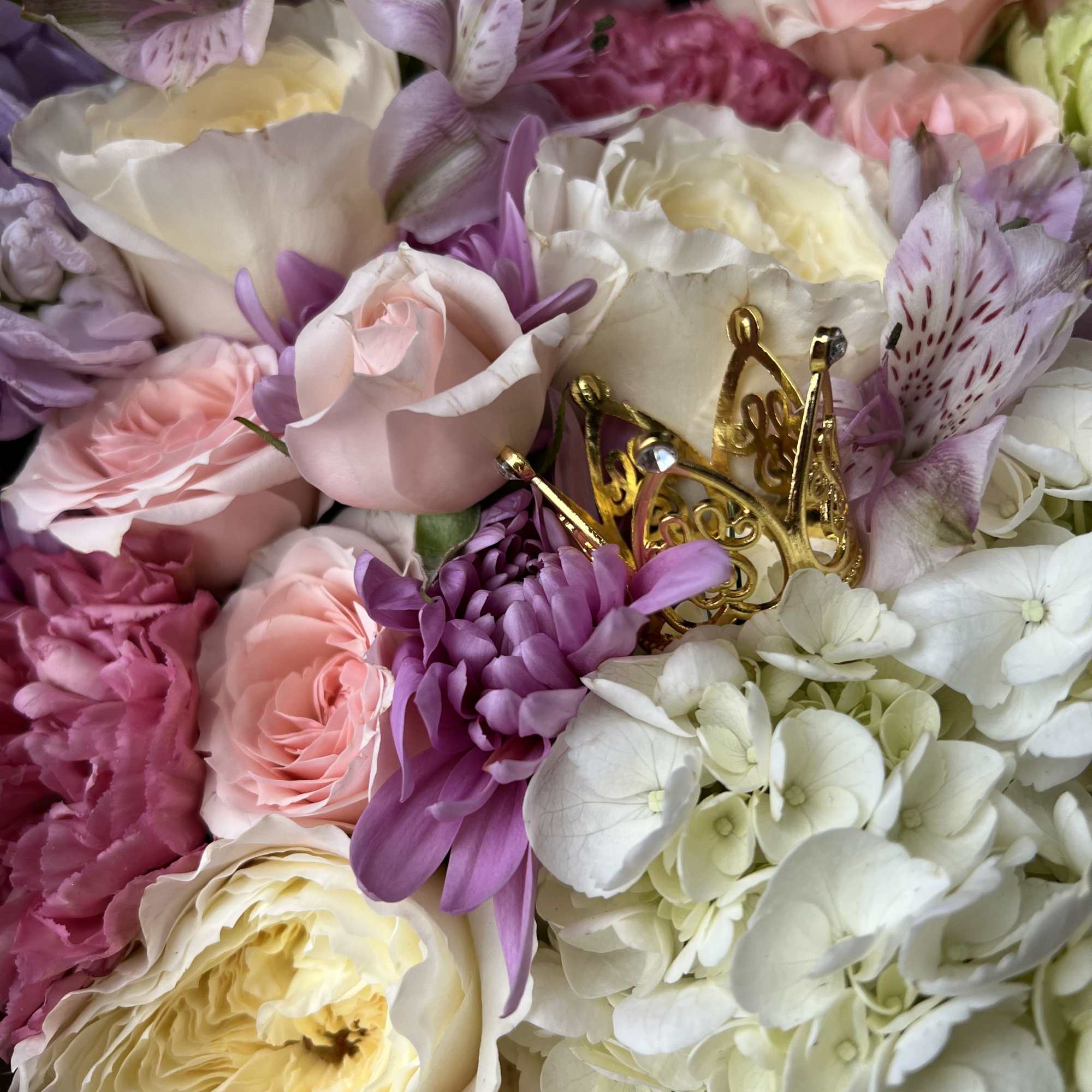 A dreamy pastel arrangement designed to make any birthday unforgettable. This lush