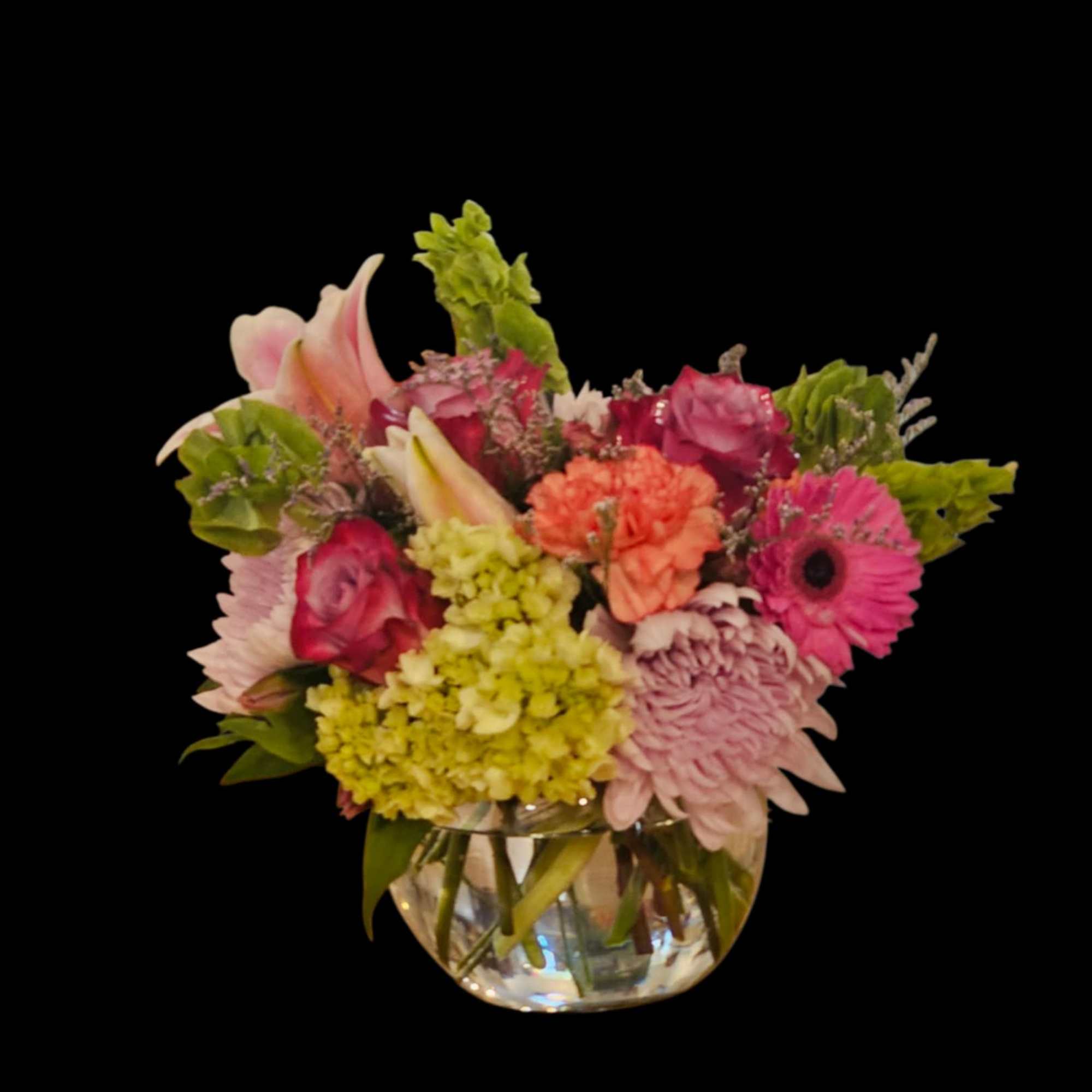 A bowl full of seasonal flowers!! Sure to delight anyone!  A