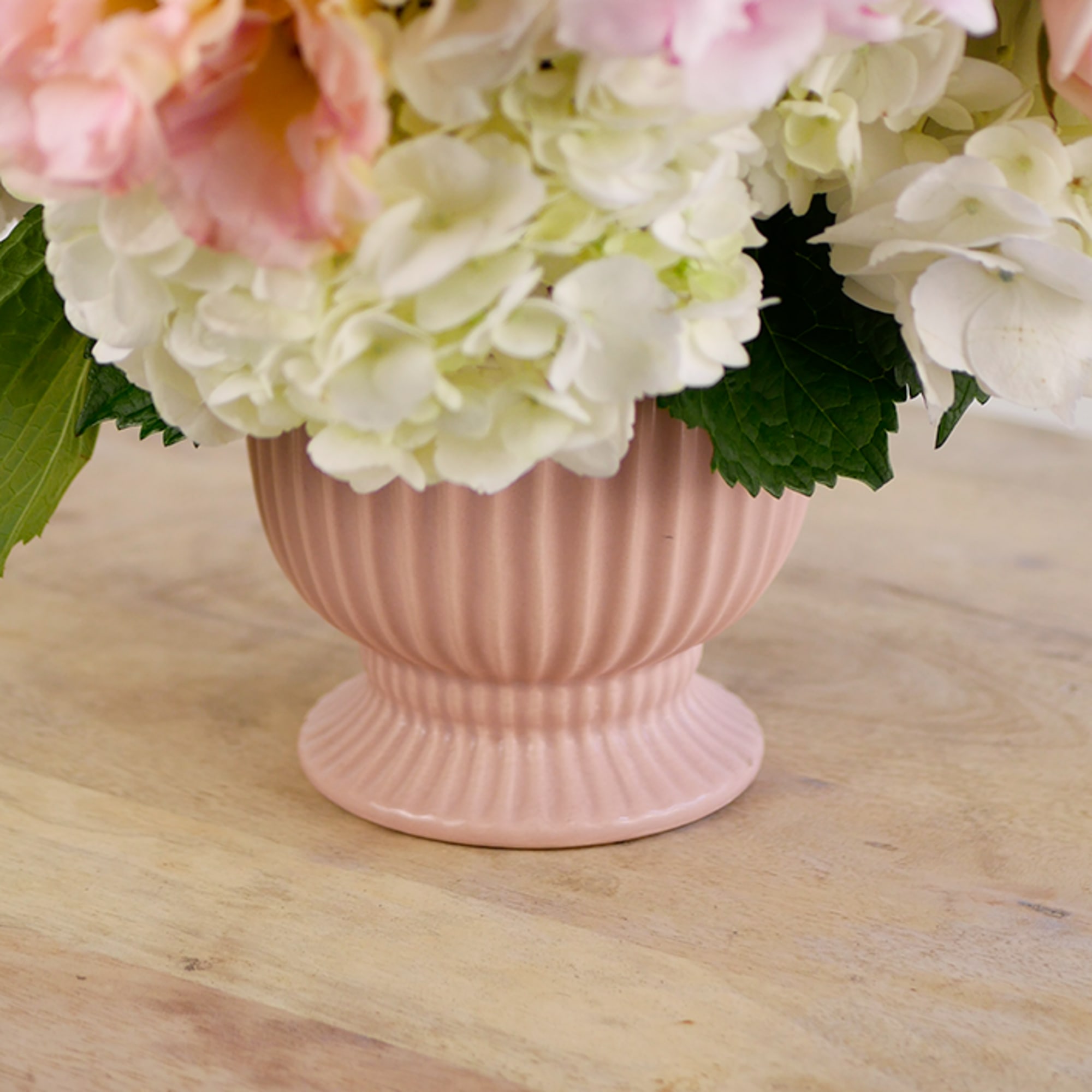 Soft, romantic, and effortlessly graceful&mdash;"Enchanted" features lush pink peonies, delicate ranunculus, premium