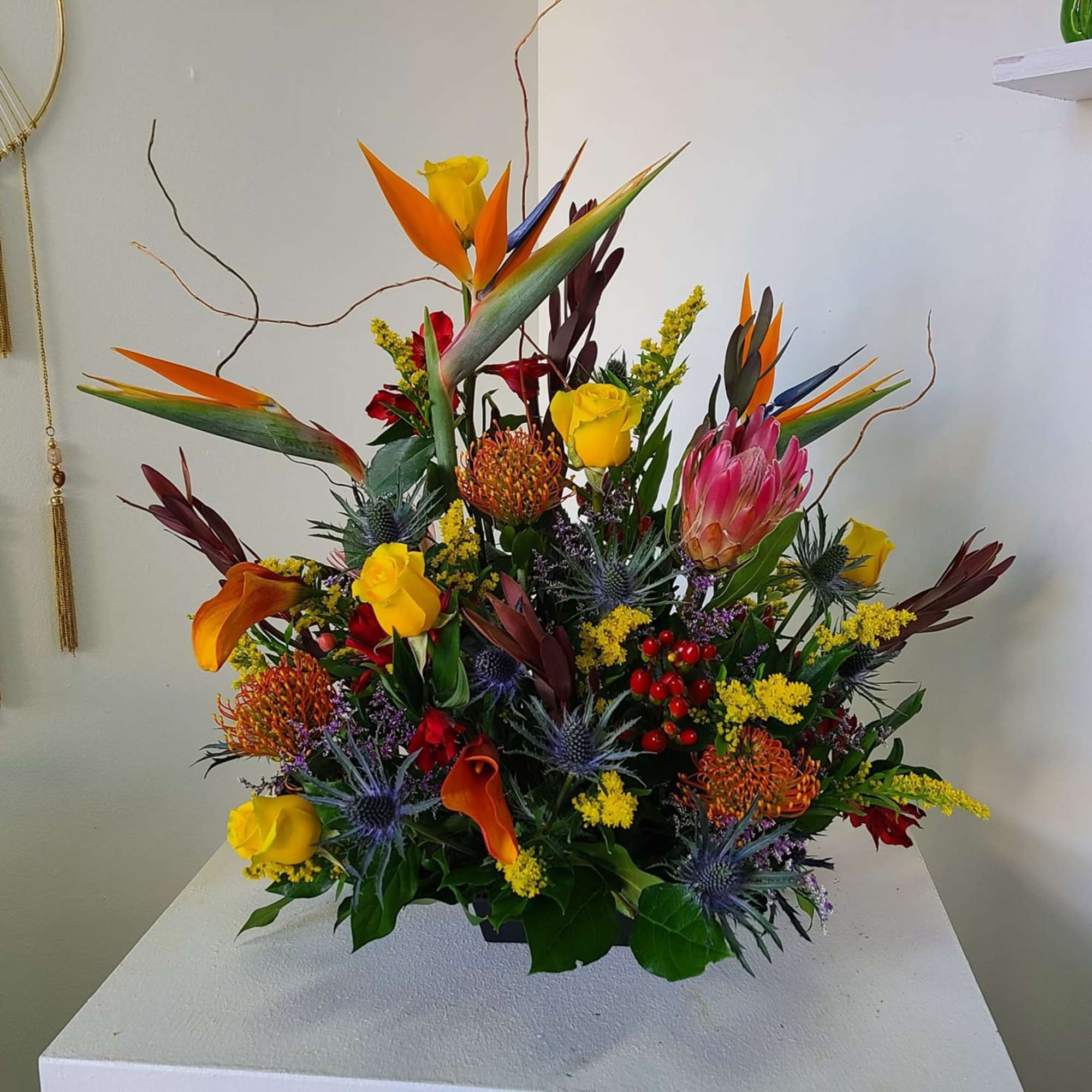 This wonderful array of exotic flowers is a contemporary work of floral