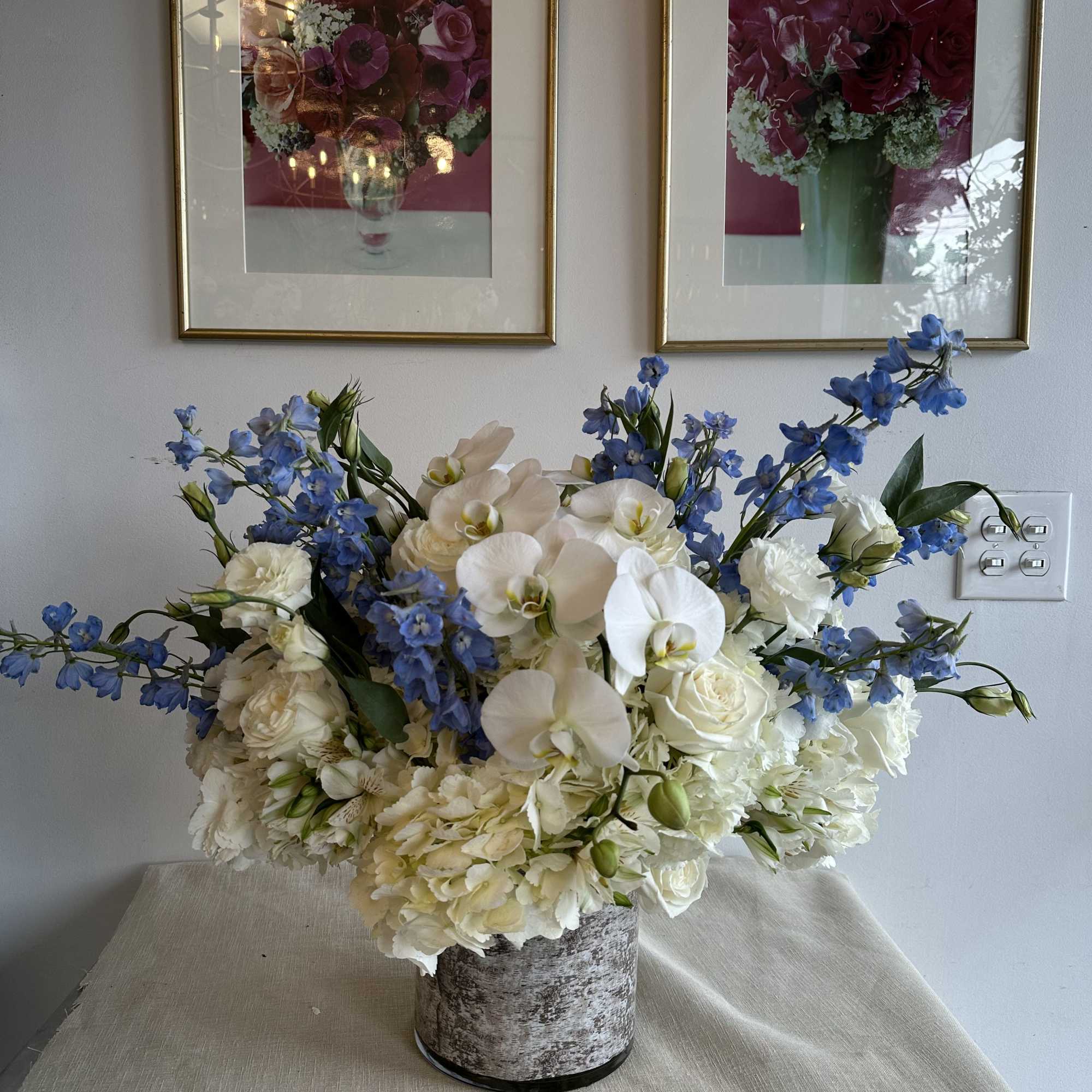 lisianthus with hydrangea, delphinium, white orchid, playa Blanca roses
