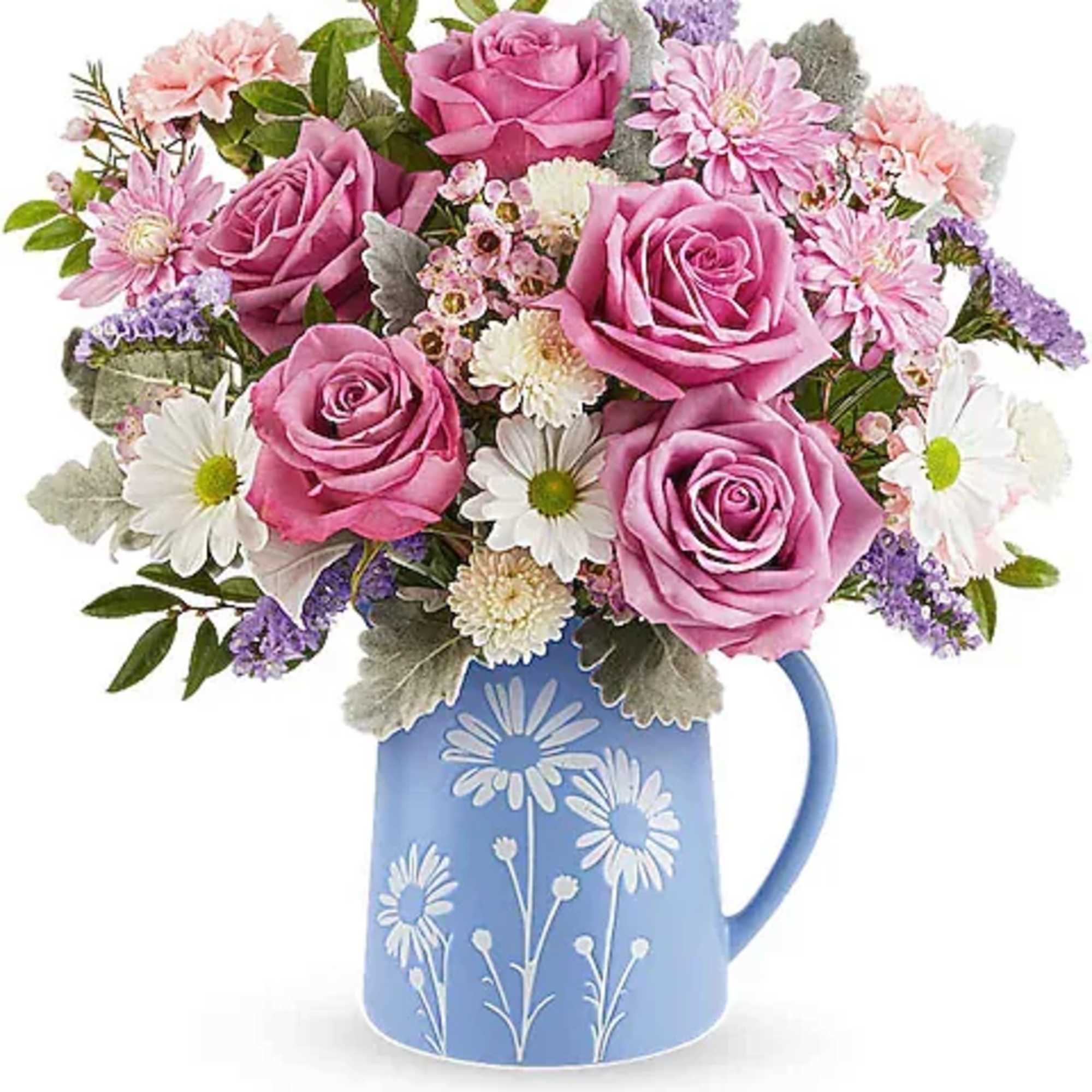 Like a gentle breeze across a spring meadow, the Pastel Meadow Bouquet