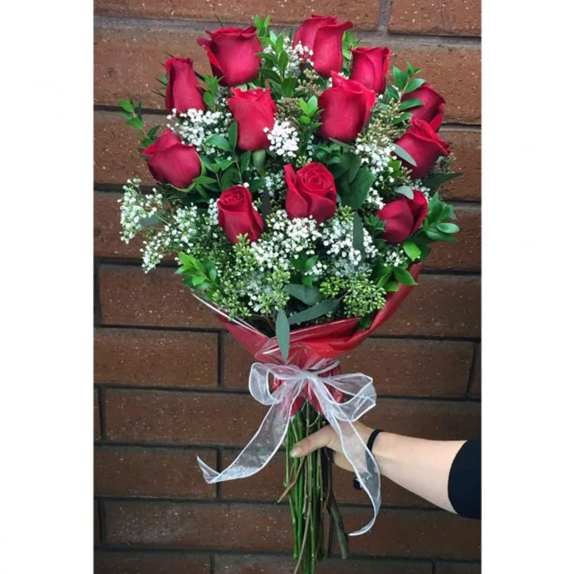 Show your love with our hand-tied bouquet of Ecuadorian long stem roses.