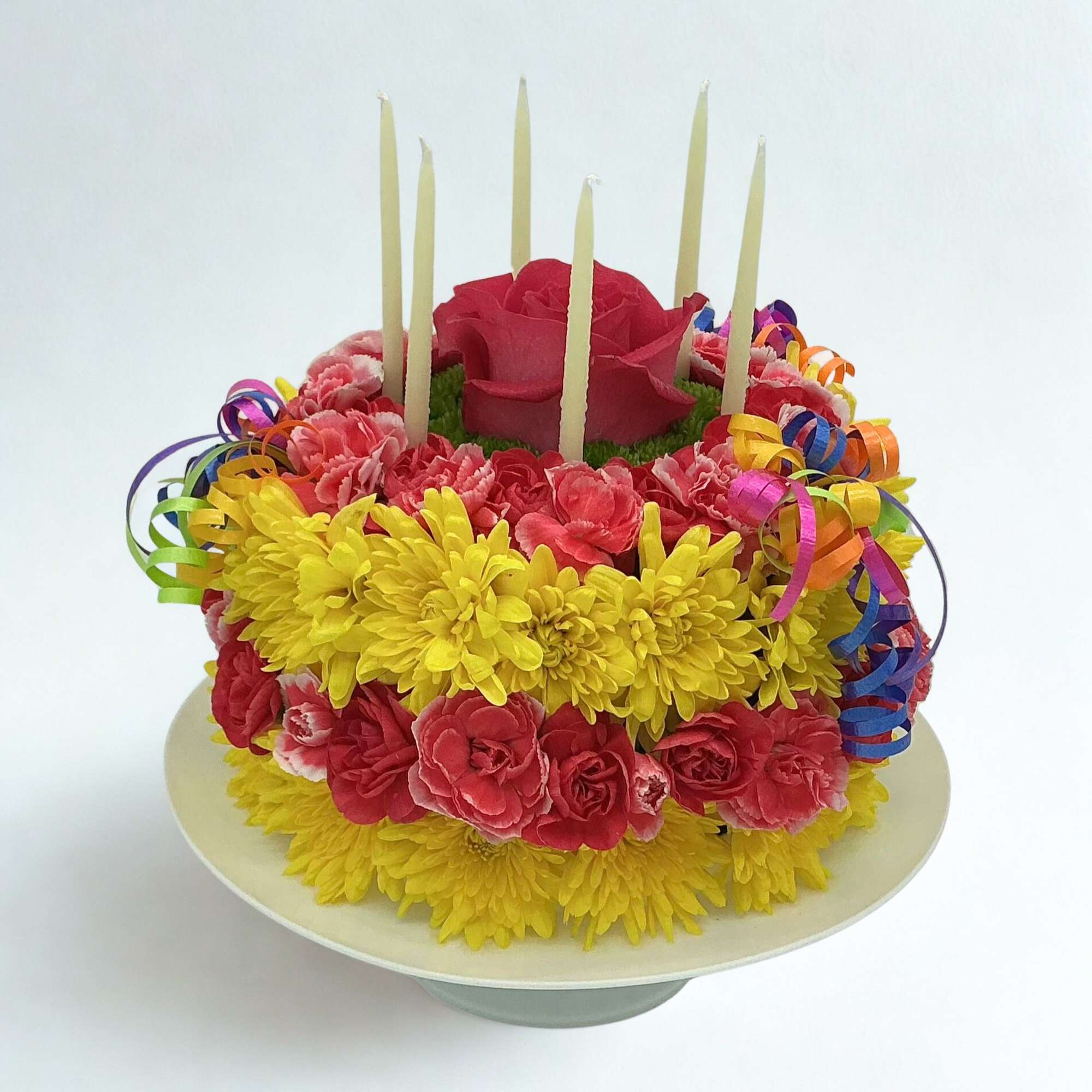 Send Birthday wishes with this adorable cake made of flowers. Color customization