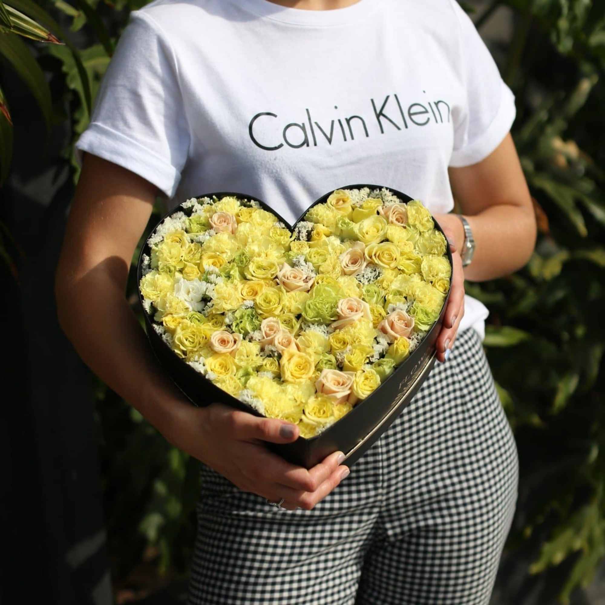 My heart is an assorted mix of flowers in a heart-shaped box.