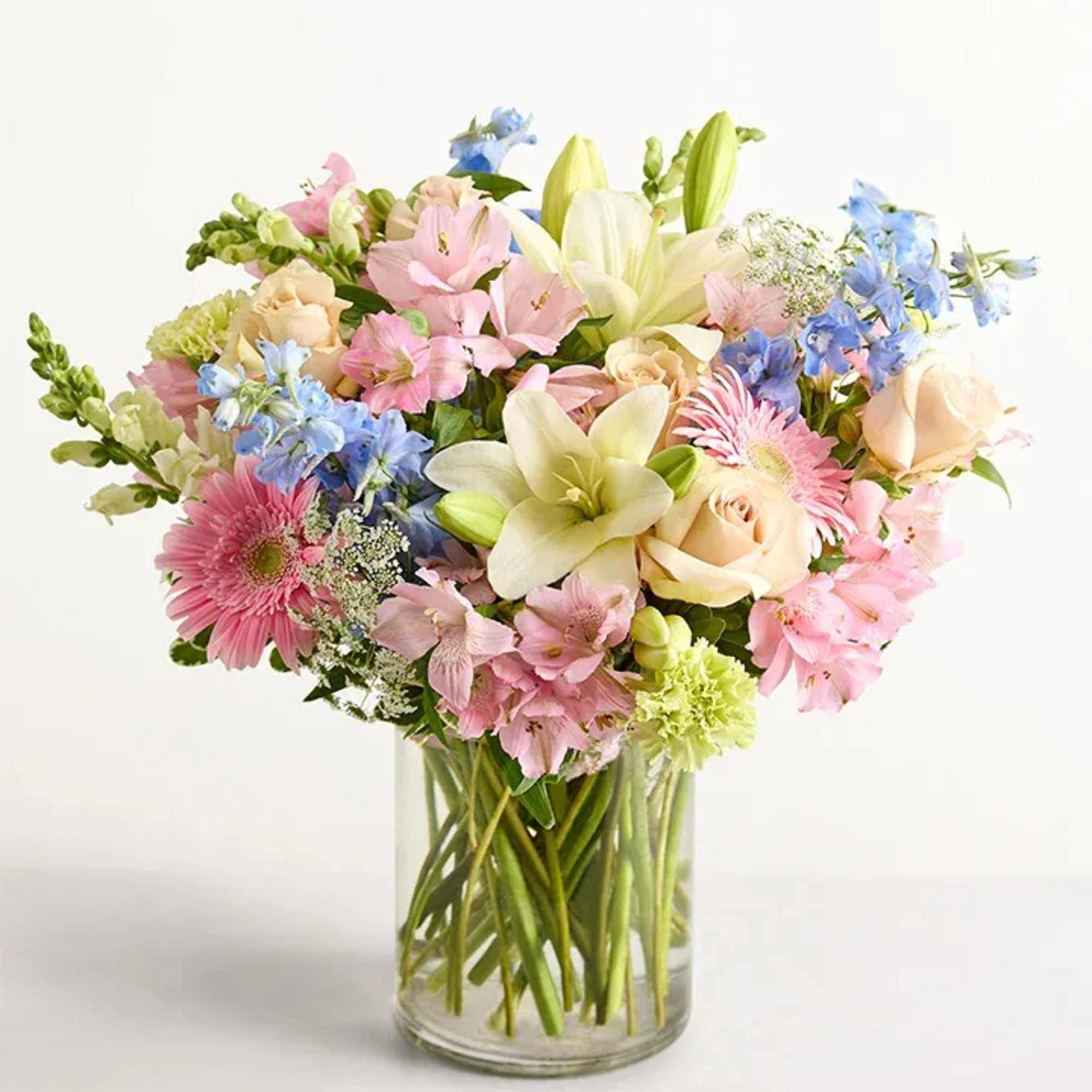Soft, romantic, and full of seasonal charm, our Pastel Garden Celebration arrangement