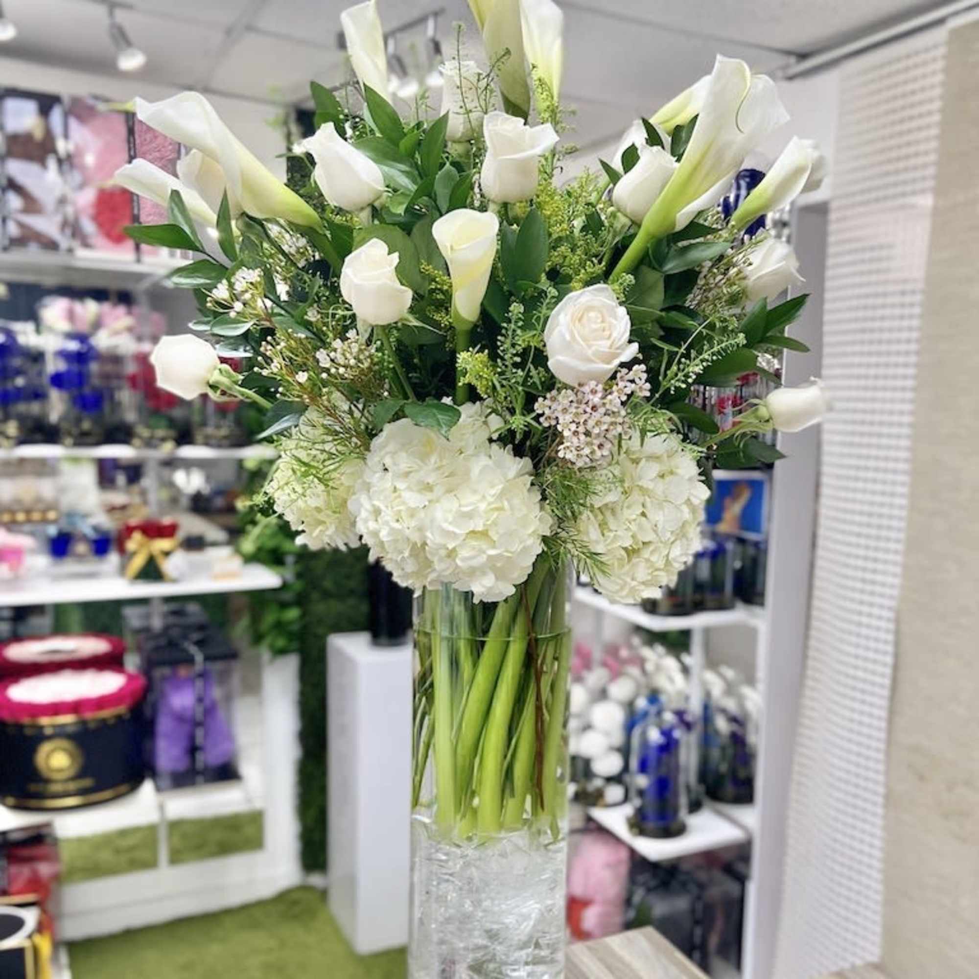 Zantedeschias Flower Bouquet: Tall and Elegant calla lilies arrangement accented with calla