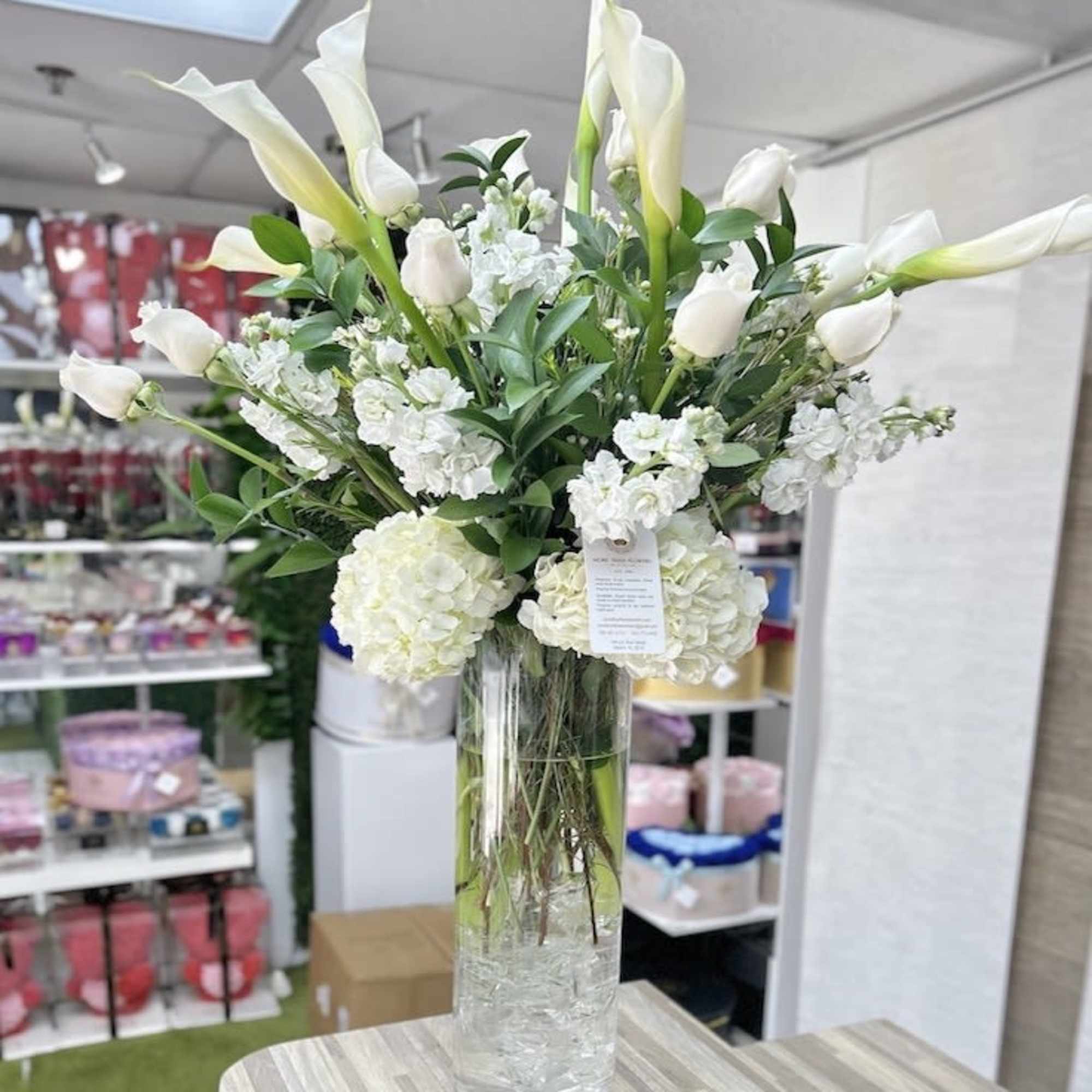 Zantedeschias Flower Bouquet: Tall and Elegant calla lilies arrangement accented with calla