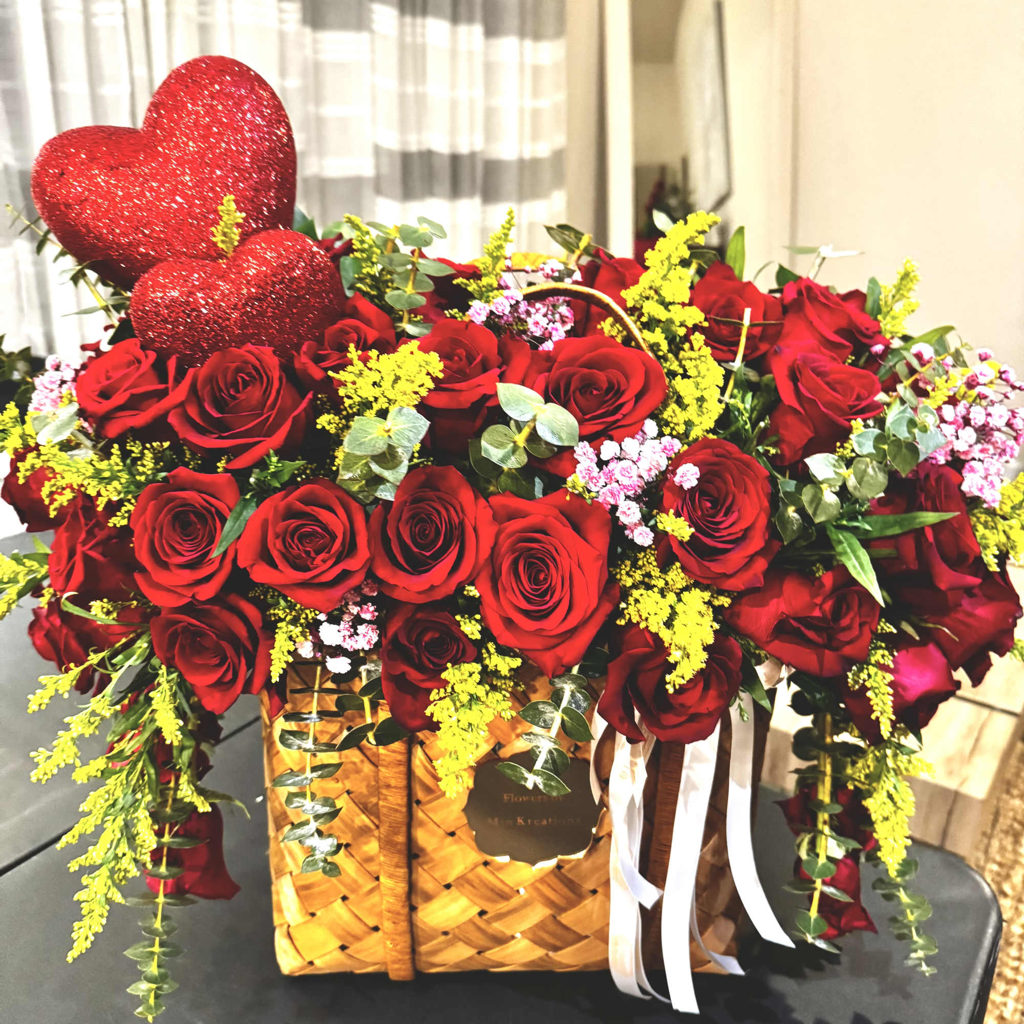 BEAUTIFUL BROWN BAG /BASKET FULL OF ROSES, UCALIPTUS AND GREENERY. PINK OR