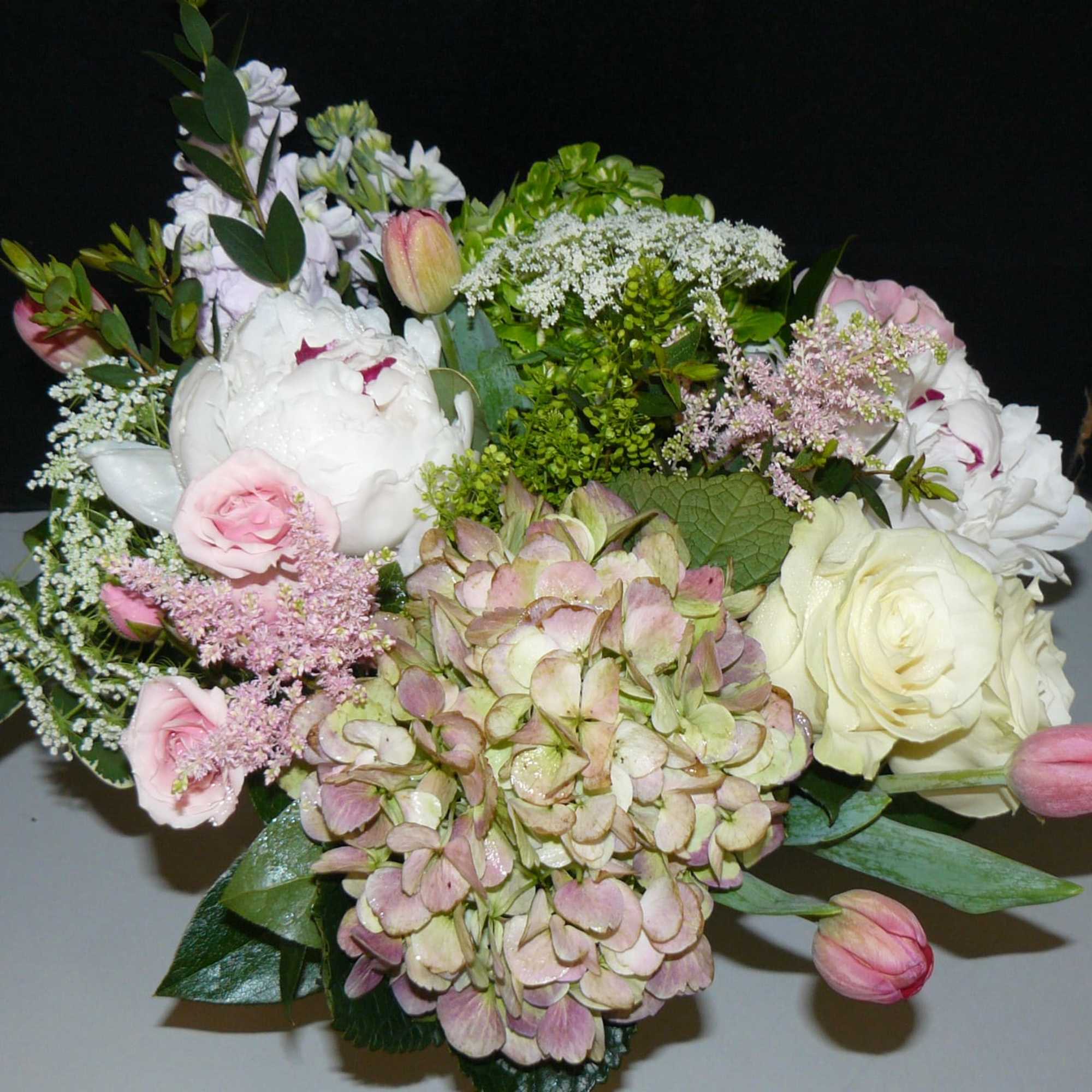 Peonies(Seasonal), Variety of Hydrangea, Roses, Queen Anne Lace, Tulips(Seasonal). Spray Roses, Astibe