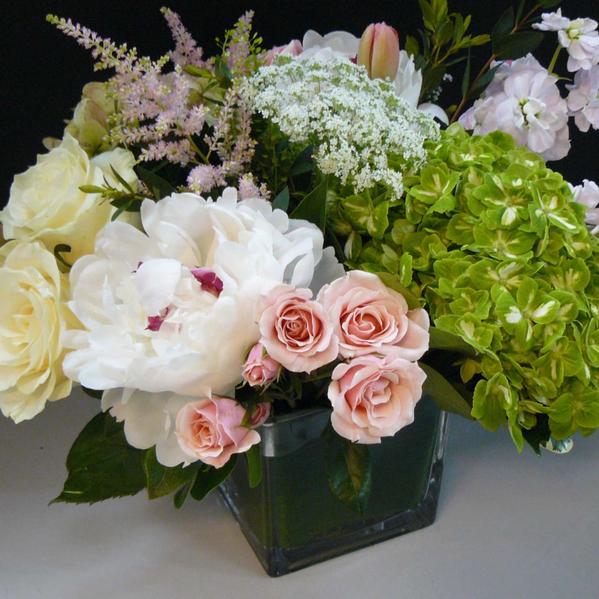 Peonies(Seasonal), Variety of Hydrangea, Roses, Queen Anne Lace, Tulips(Seasonal). Spray Roses, Astibe
