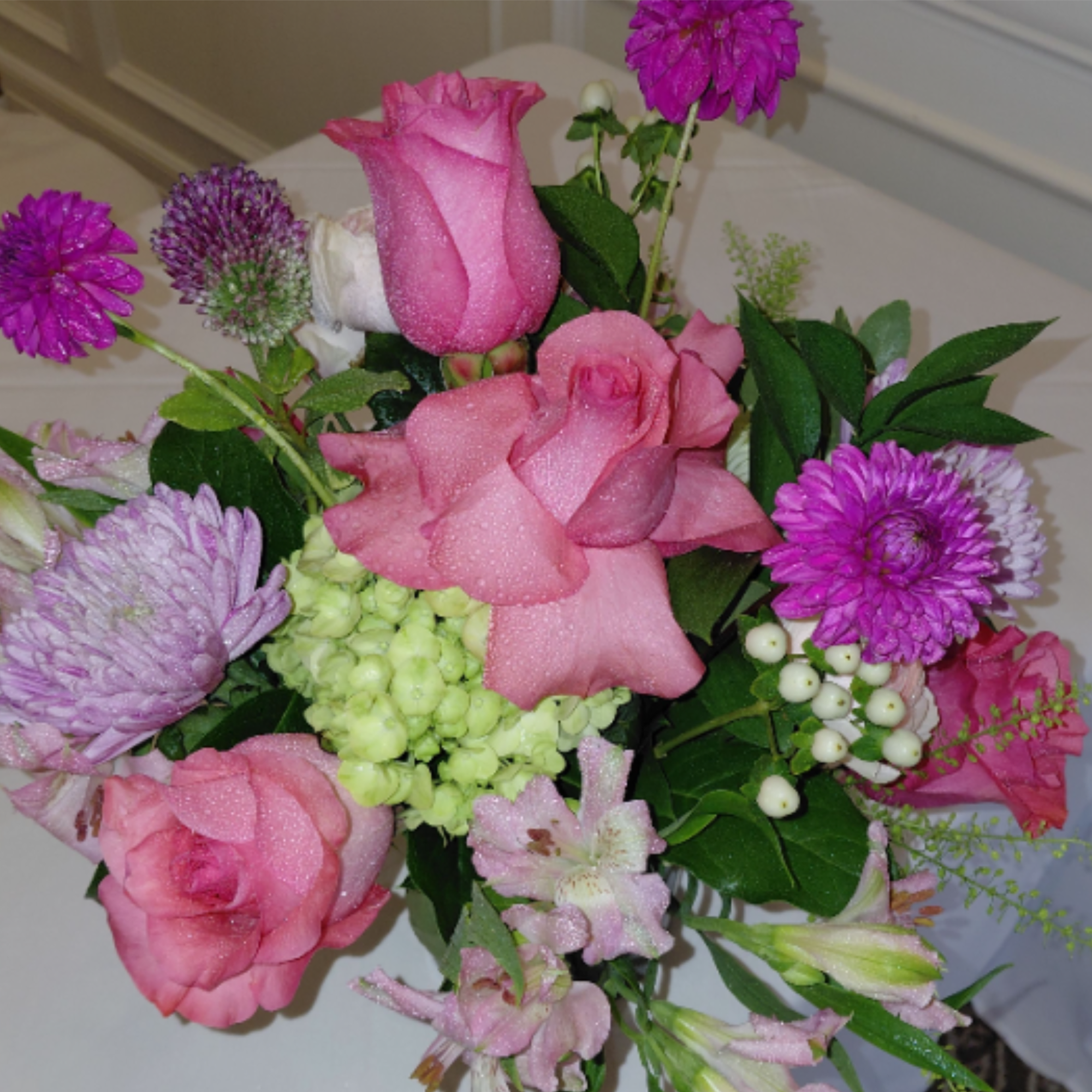 Roses, Hydrangea,  Cremons, Dahlias(Seasonal),  Astromeria, Hypericum, Ruscus, Fancy Greens