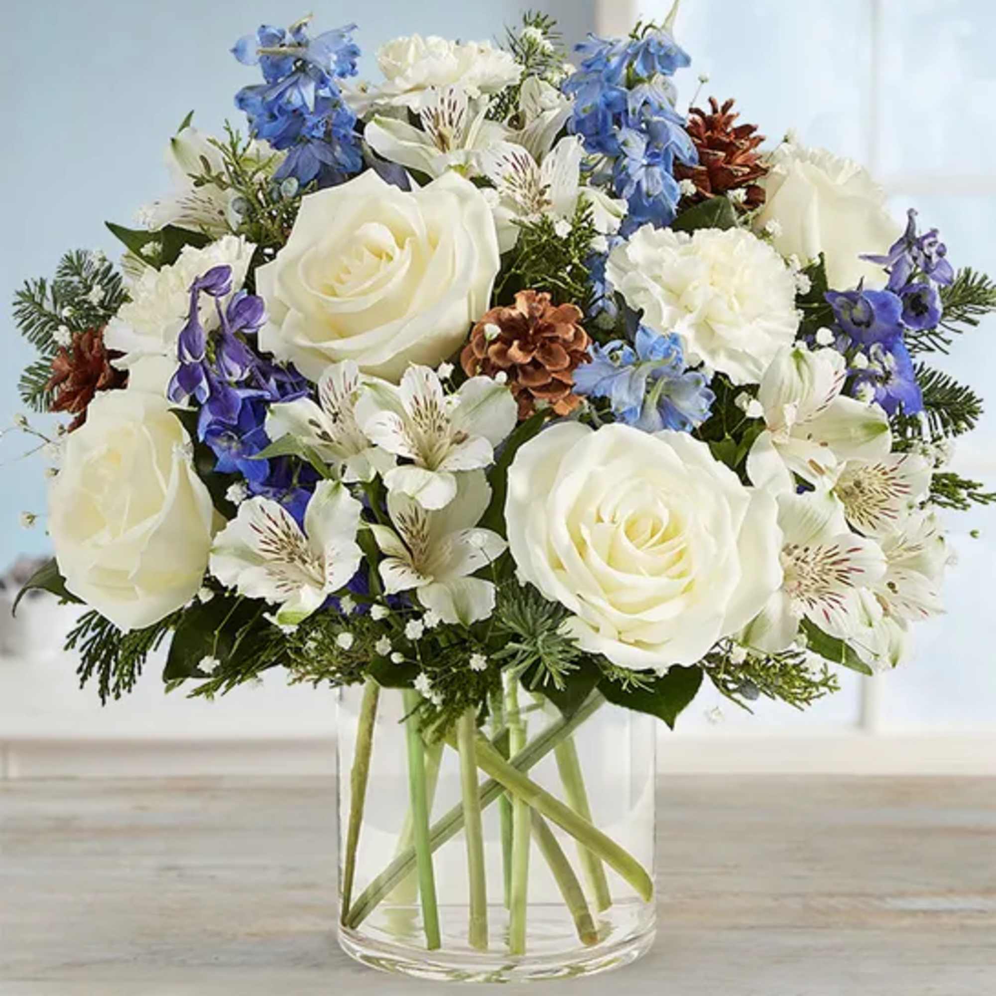 Inspired by winter&rsquo;s cool white &amp; blue landscape, our charming arrangement captures