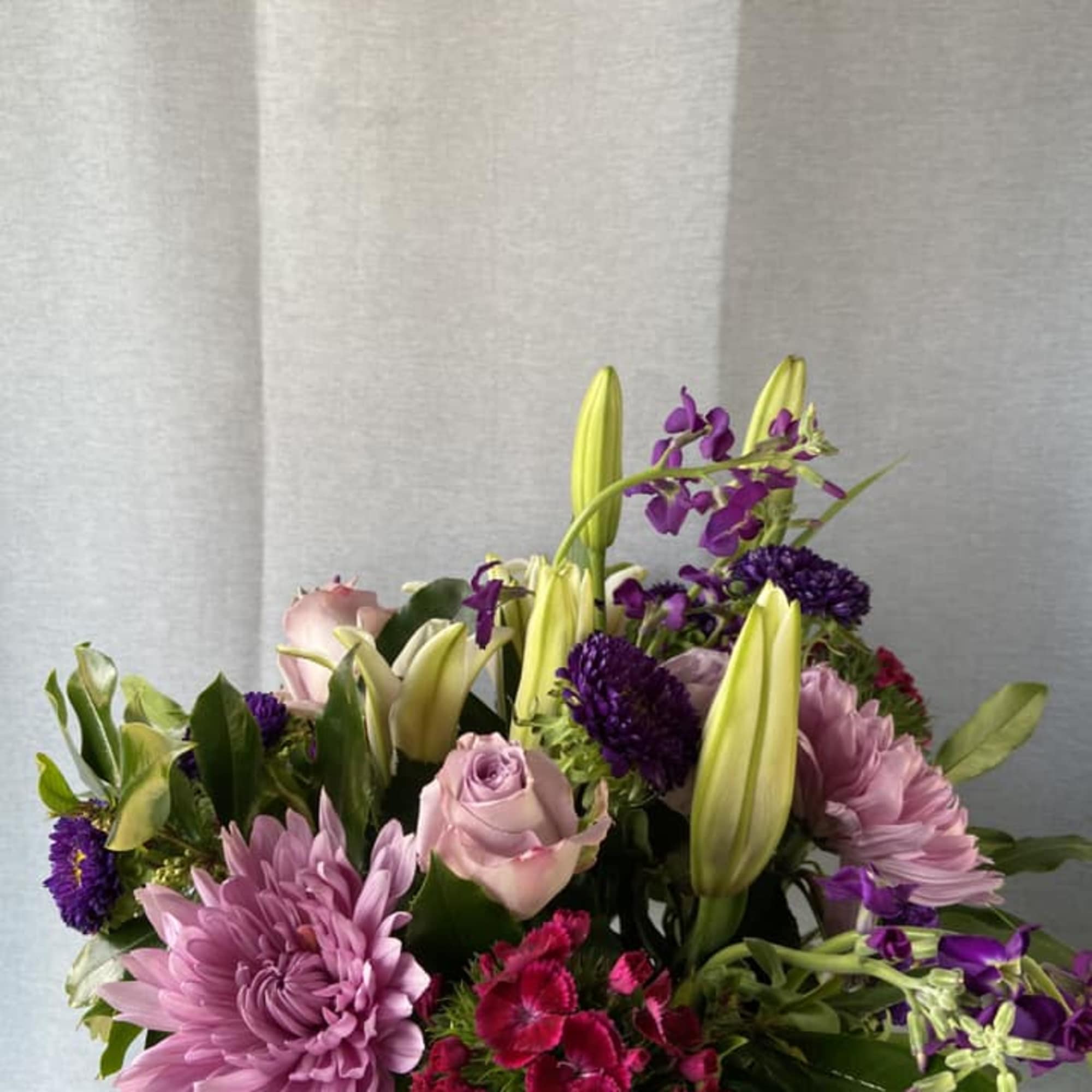  Fresh picked flowers in a ray of purple and lavenders 
