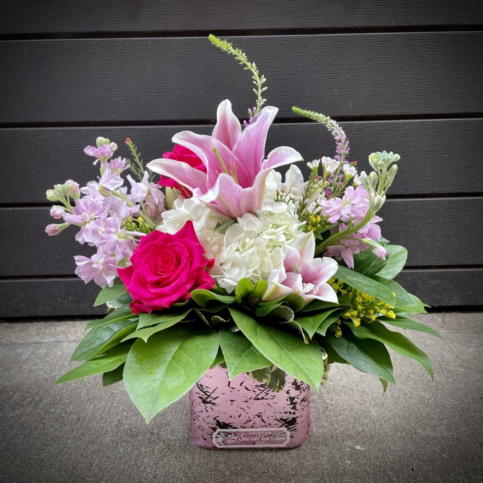 The "Graceful Garden" design is a lovely bouquet in Pink, Yellow and