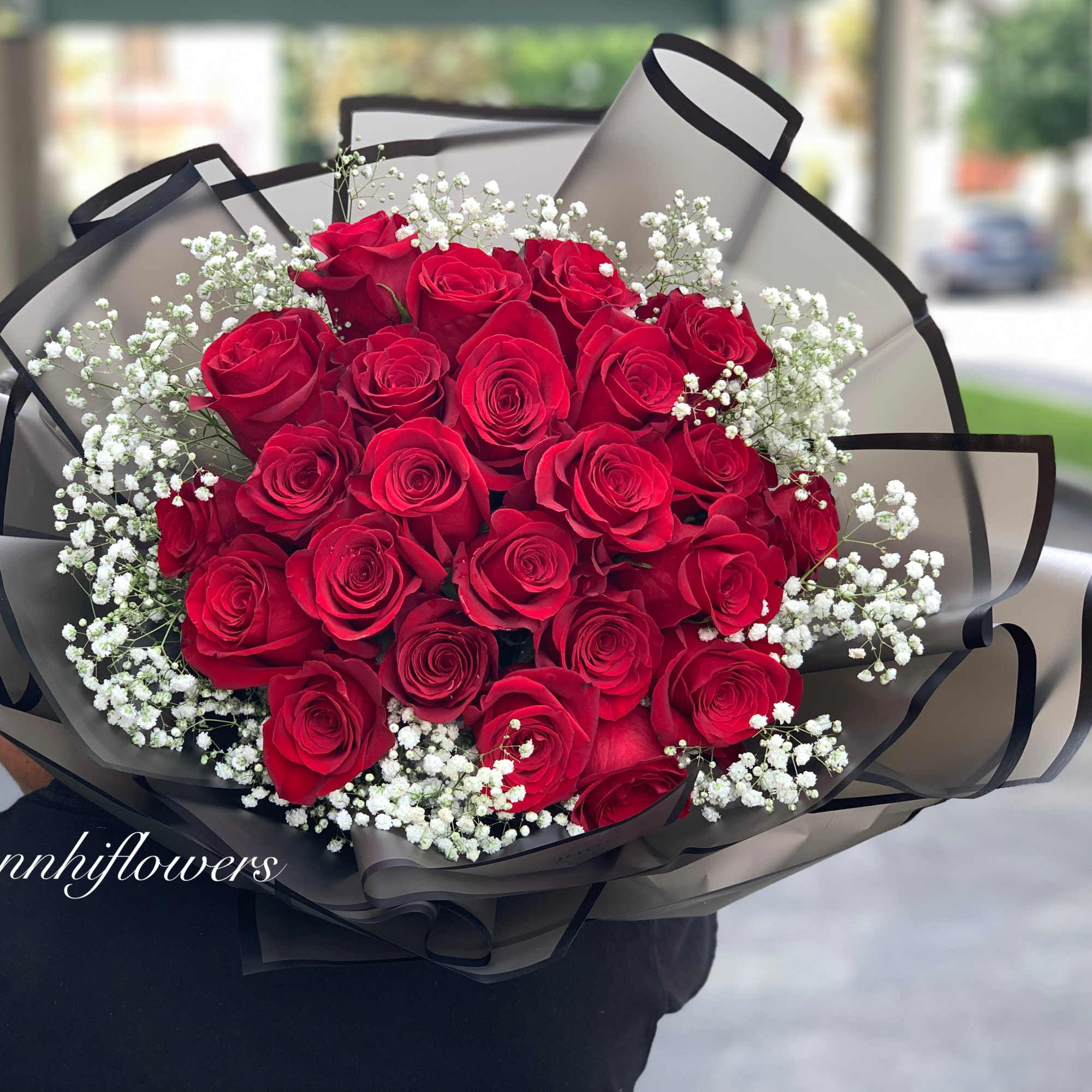 The Photo is Standard 12 premium long stem roses. Deluxe is 2