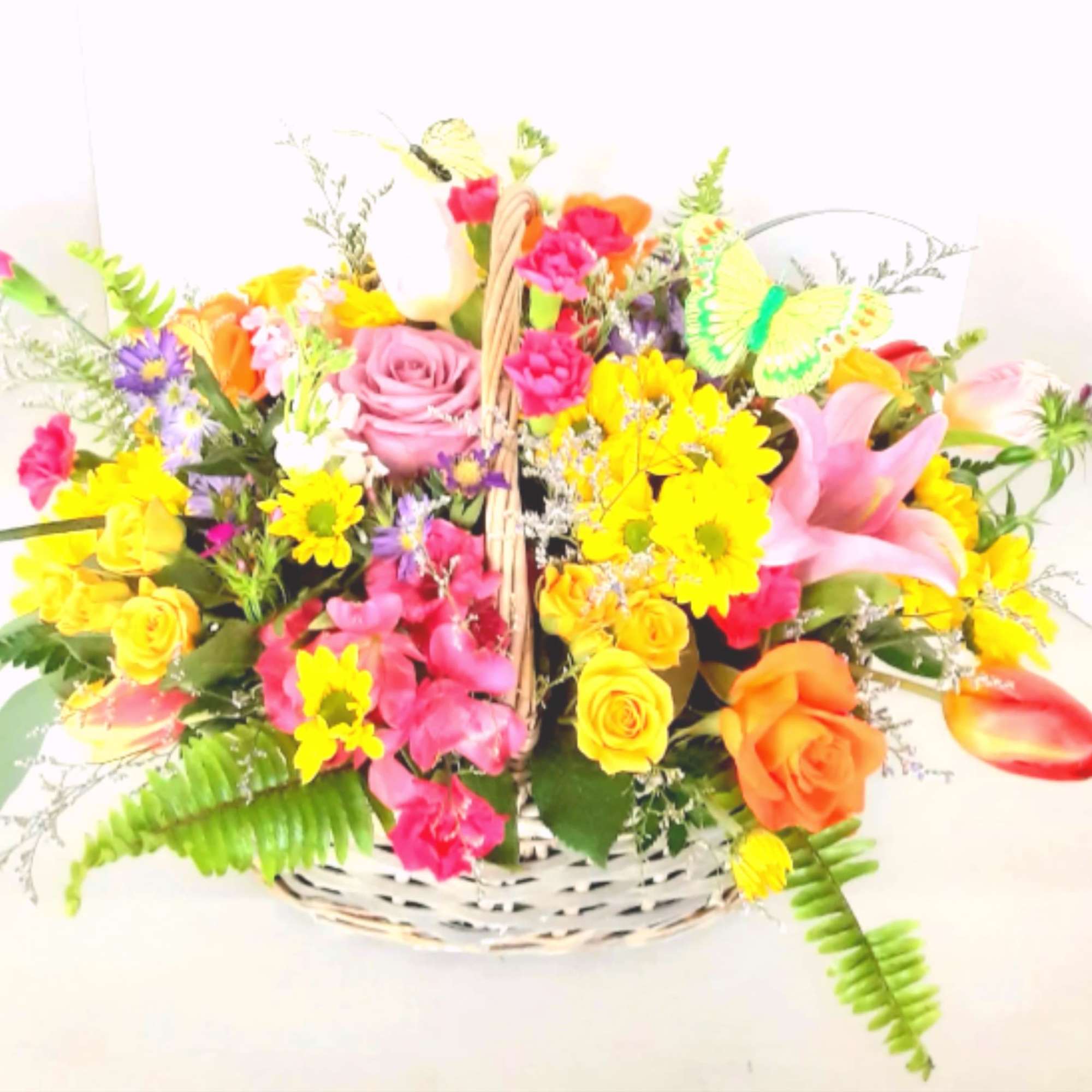 A large mix of spring flowers, tulips, daisies, lilies, roses and so