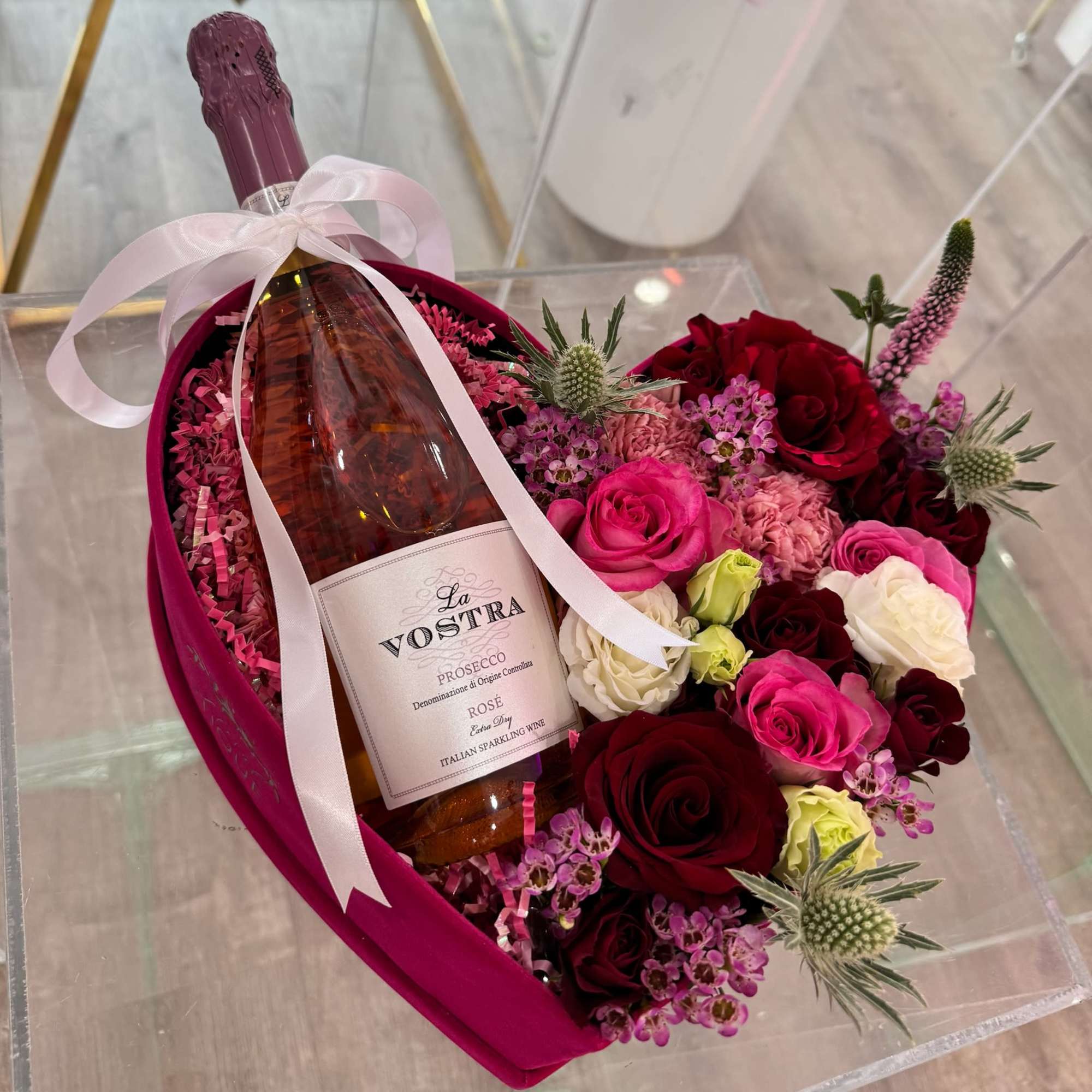 Our Signature Heart Box filled with an assortment of premium flowers and