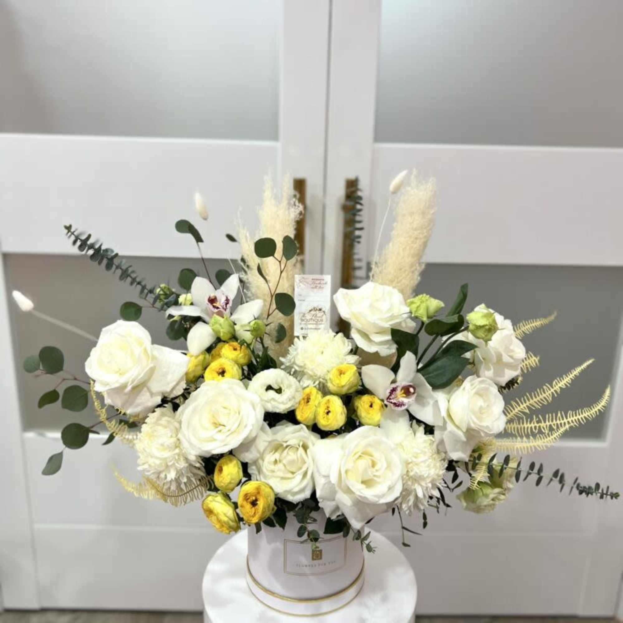 Floral Box with an assortment of premium premium roses, orchids, eucalyptus, pampas