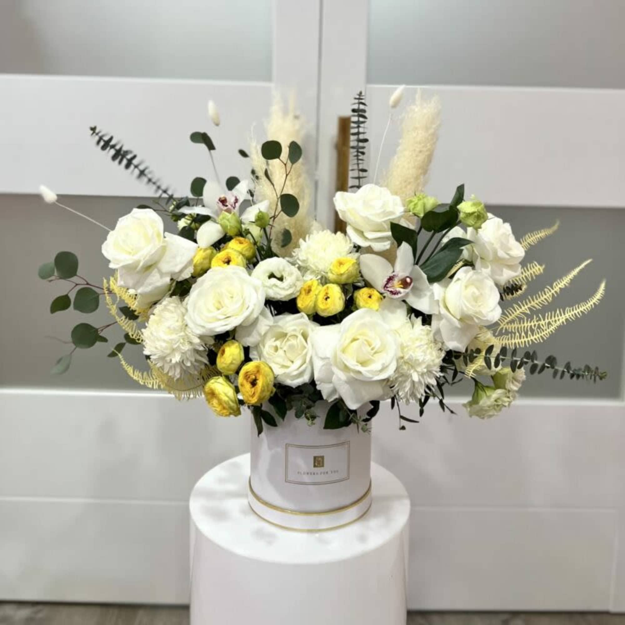Floral Box with an assortment of premium premium roses, orchids, eucalyptus, pampas