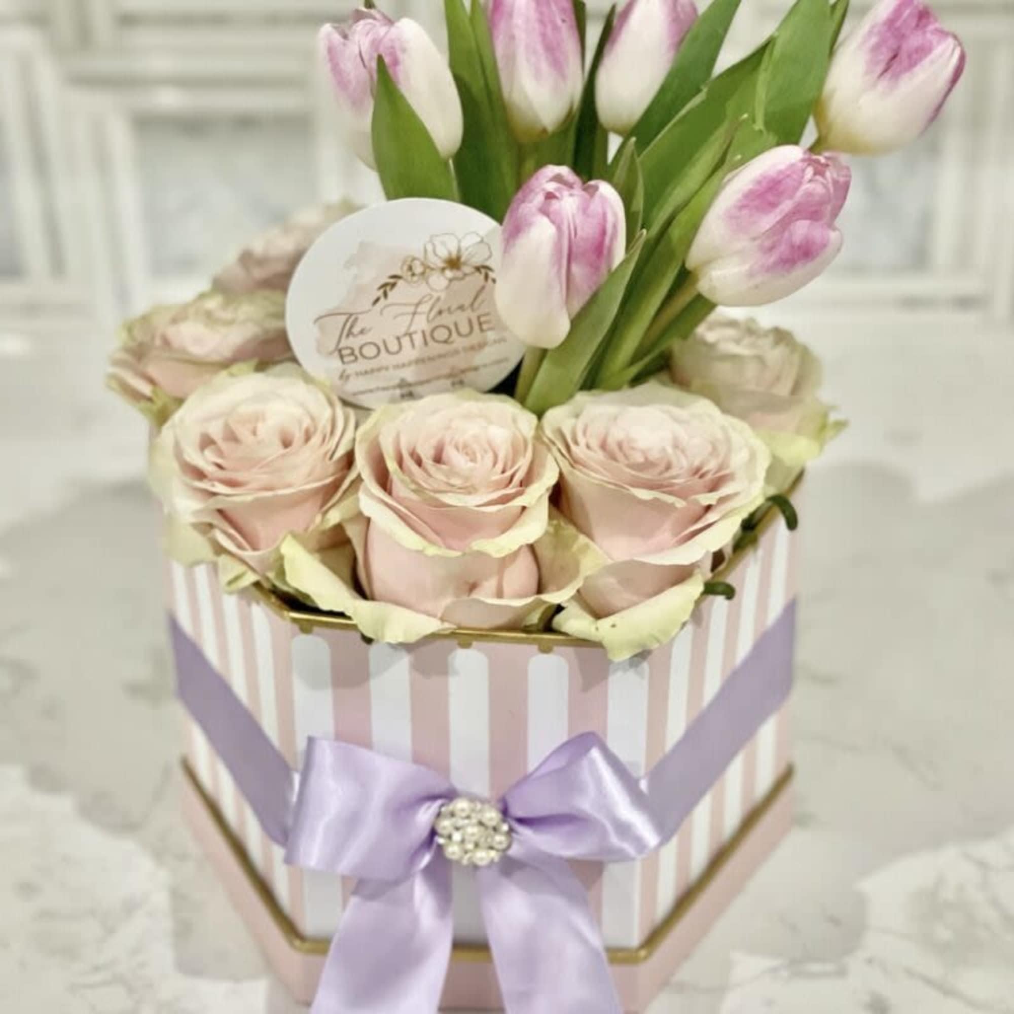 24 premium roses with accent flowers and orchids