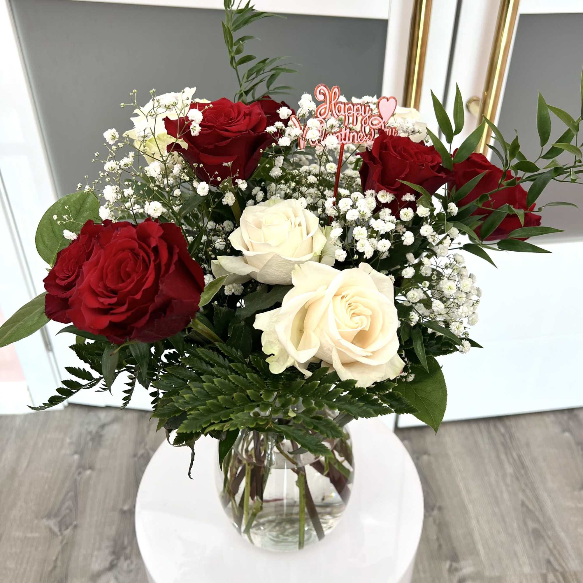 Say I love you with our beautiful all in red roses arrangement