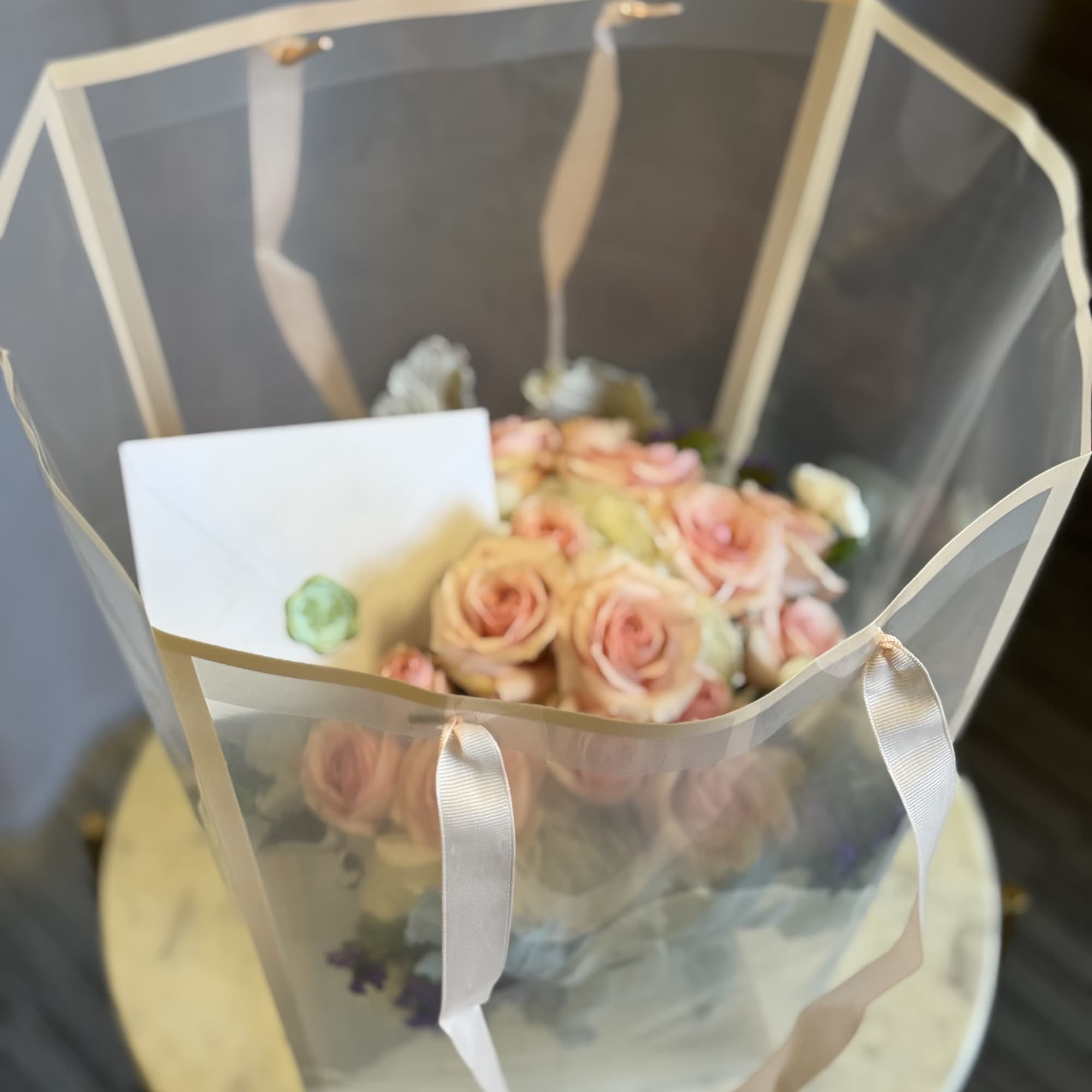 A soft and romantic floral design featuring premium blush roses beautifully paired