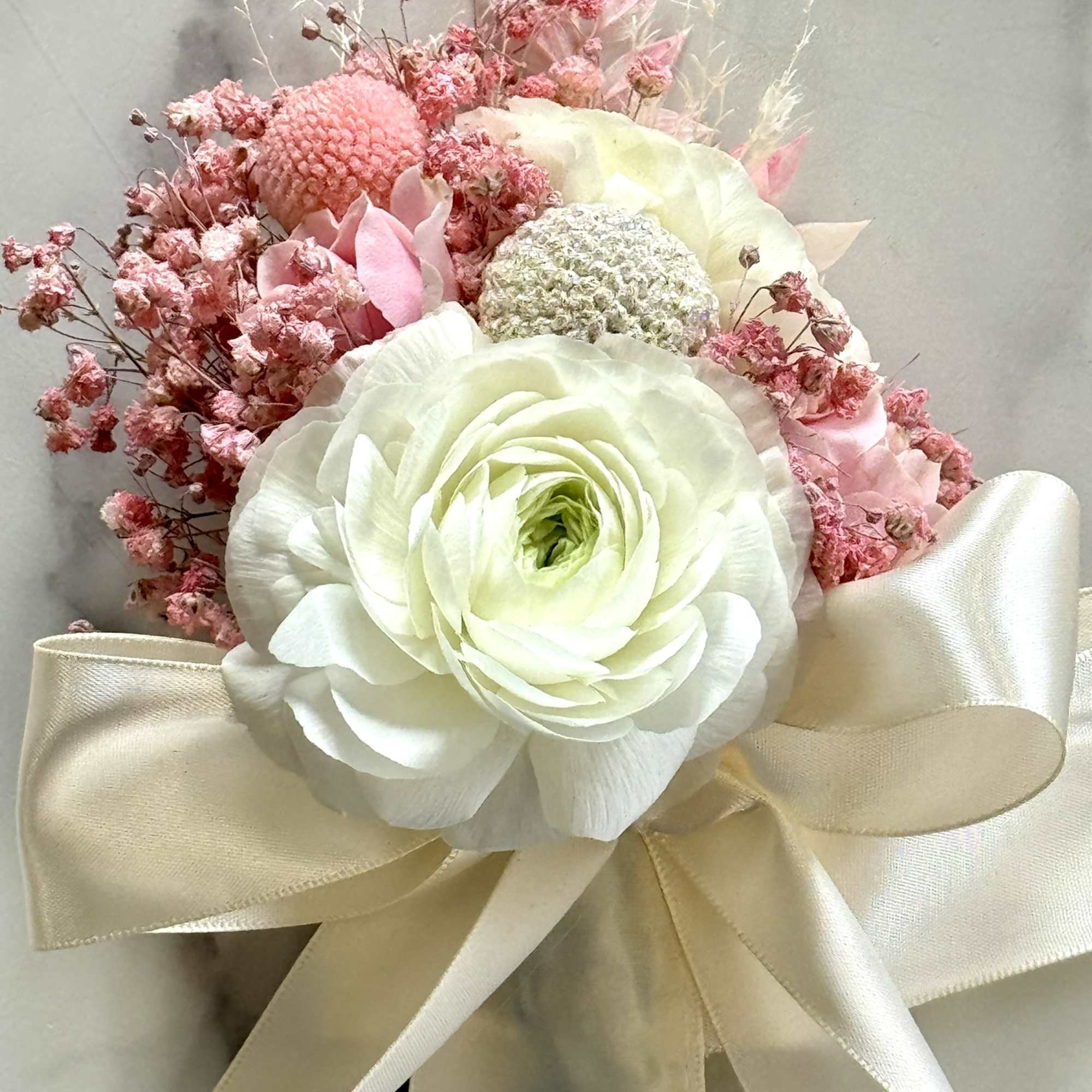 Adorn your special occasion with elegance and sophistication with our exquisite corsage