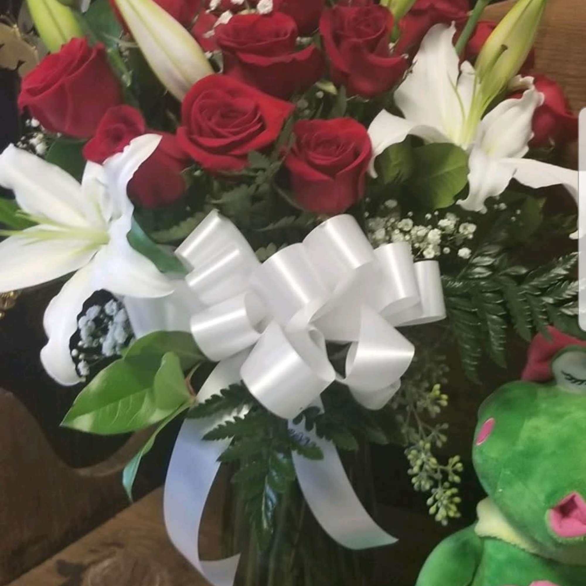 Vase of fragrant white lilies and red roses for that special one...