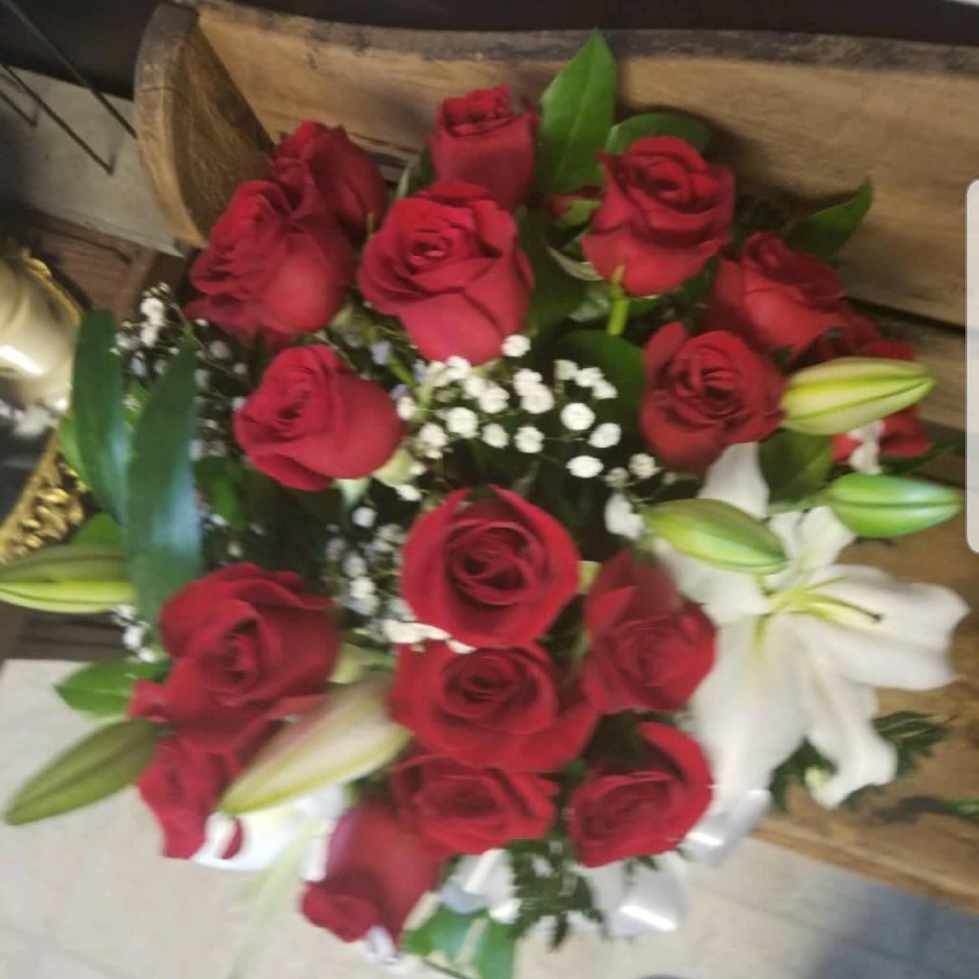 Vase of fragrant white lilies and red roses for that special one...