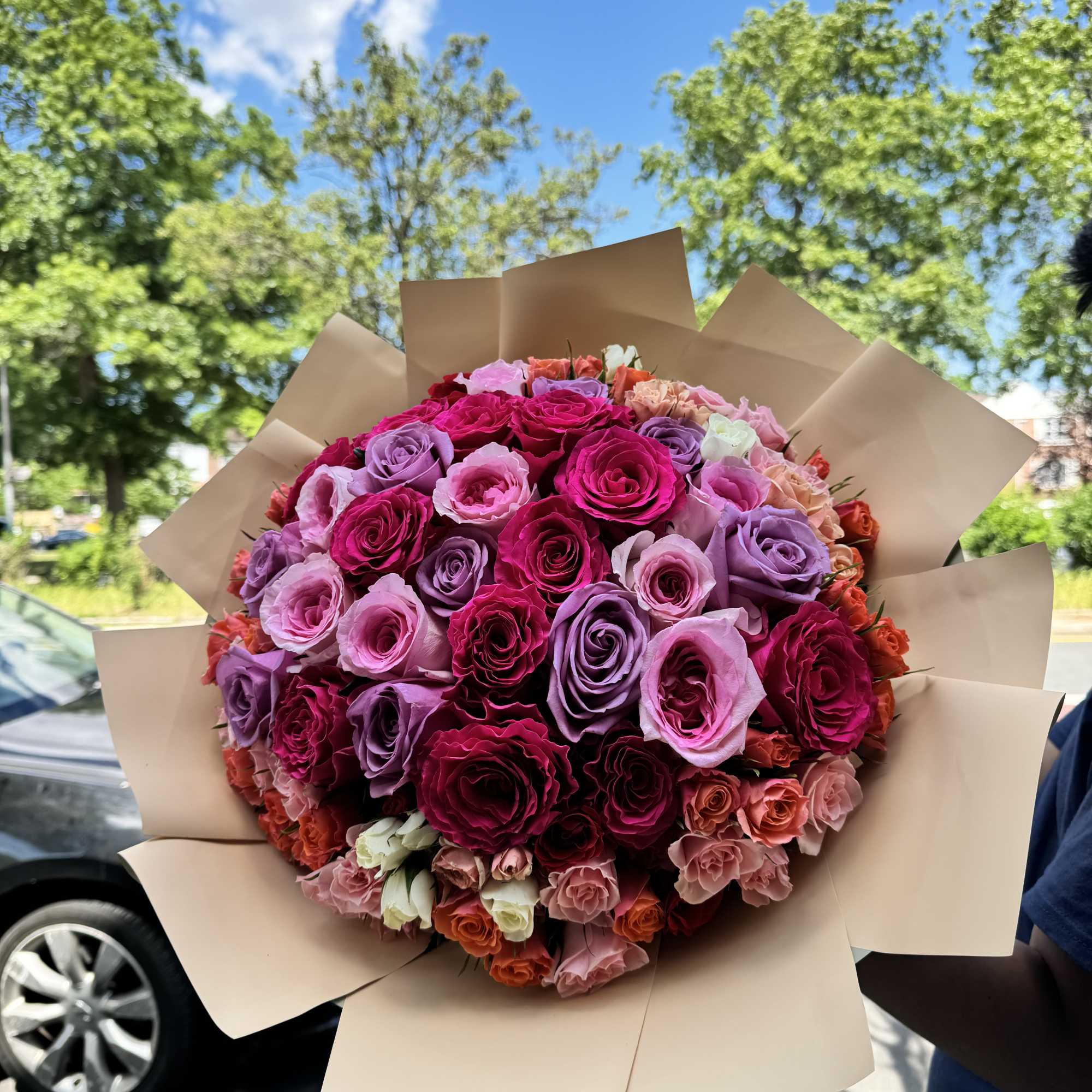 Imagine a bouquet where elegance meets charm in a symphony of roses