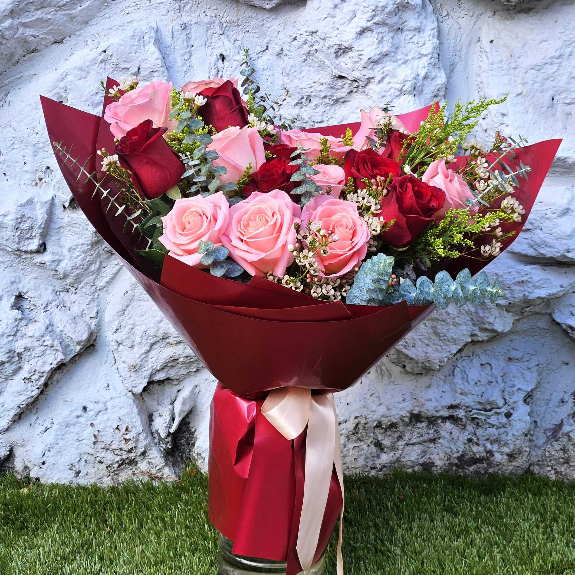 A striking blend of passion and warmth, the Fiery Love bouquet features