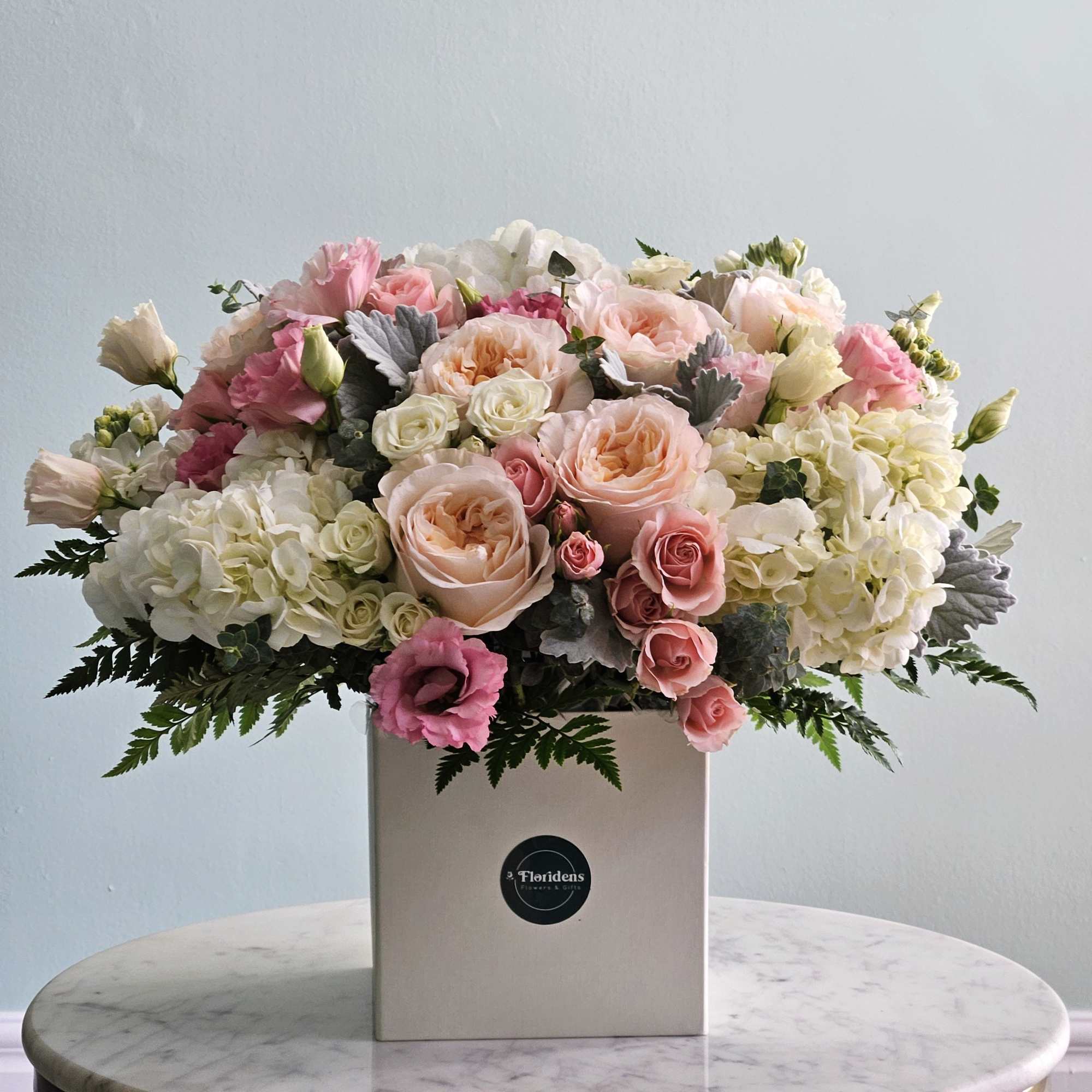 Float on air with our stunning Cloud 9 arrangement - a perfect