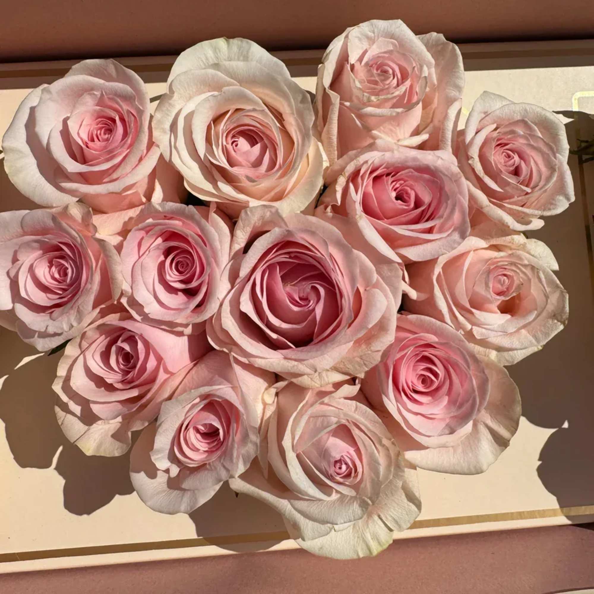 Indulge in romantic bliss with Pink Love Box. This enchanting arrangement combines