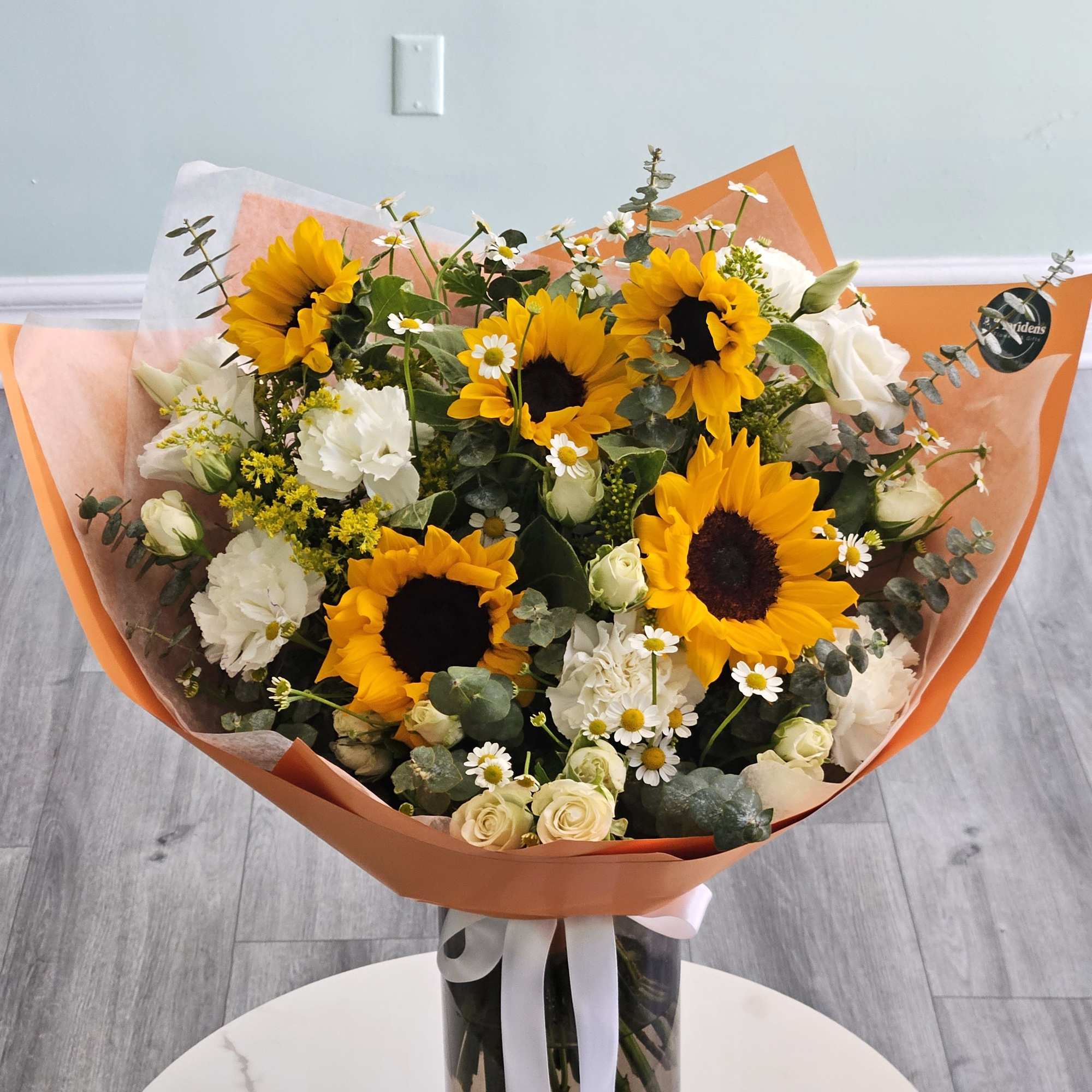 With every petal kissed by the sun, Sun-Kissed bouquet is a celebration