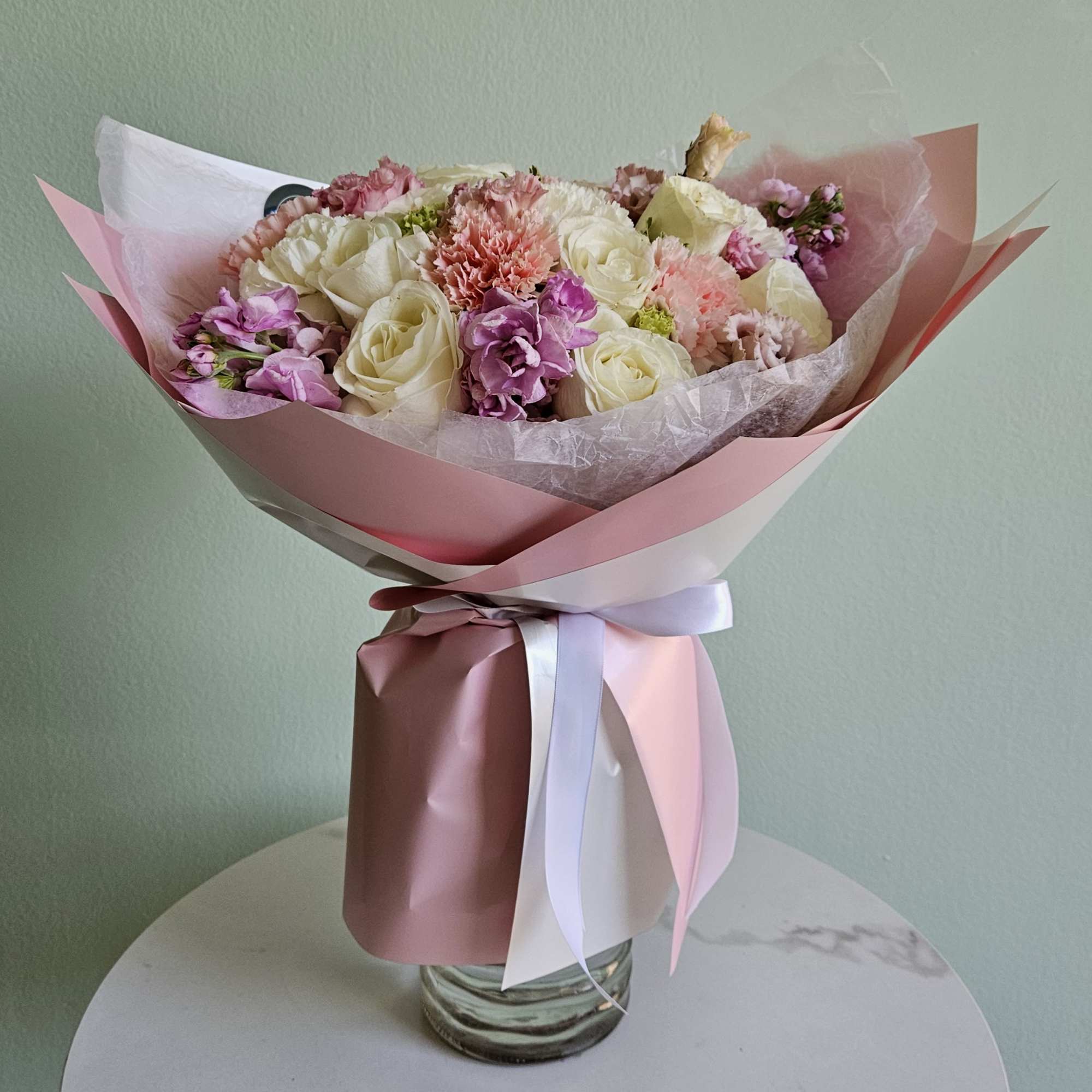 Rose Petal is a stunning bouquet that blends the elegance of white