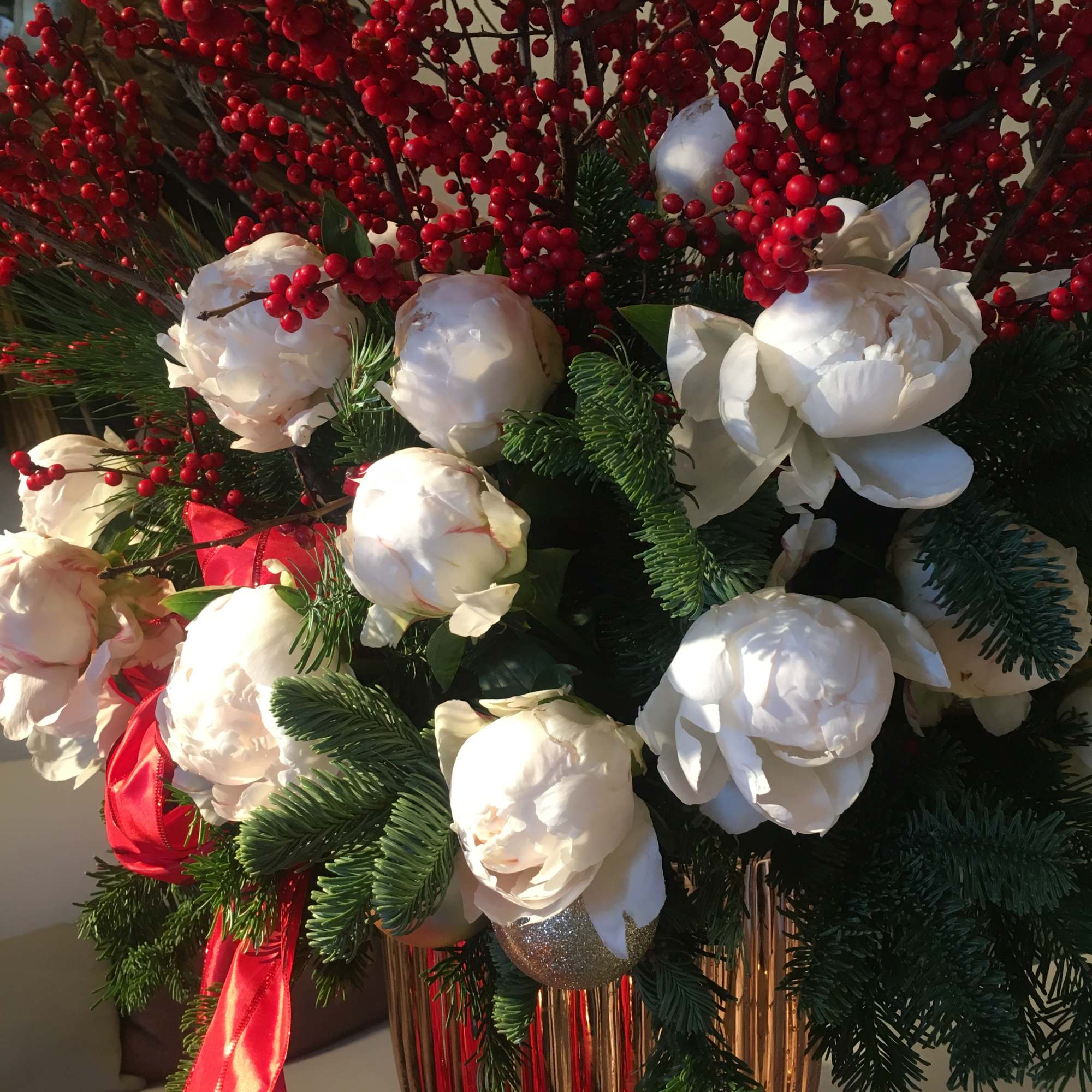 An explosion of red and white in an extravagant two-piece arrangement! This