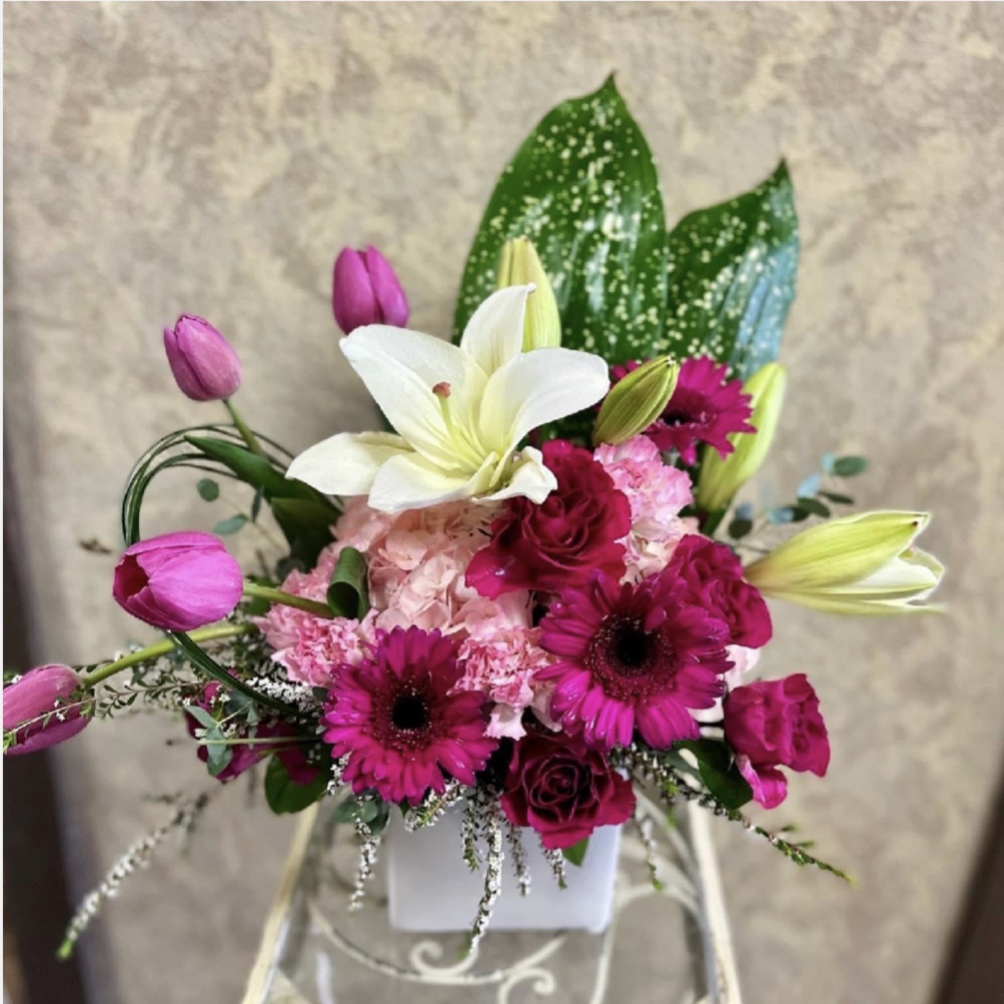 Type of Flowers: White Lilies, Pink and White Hydrangeas, Pink Roses, Pink